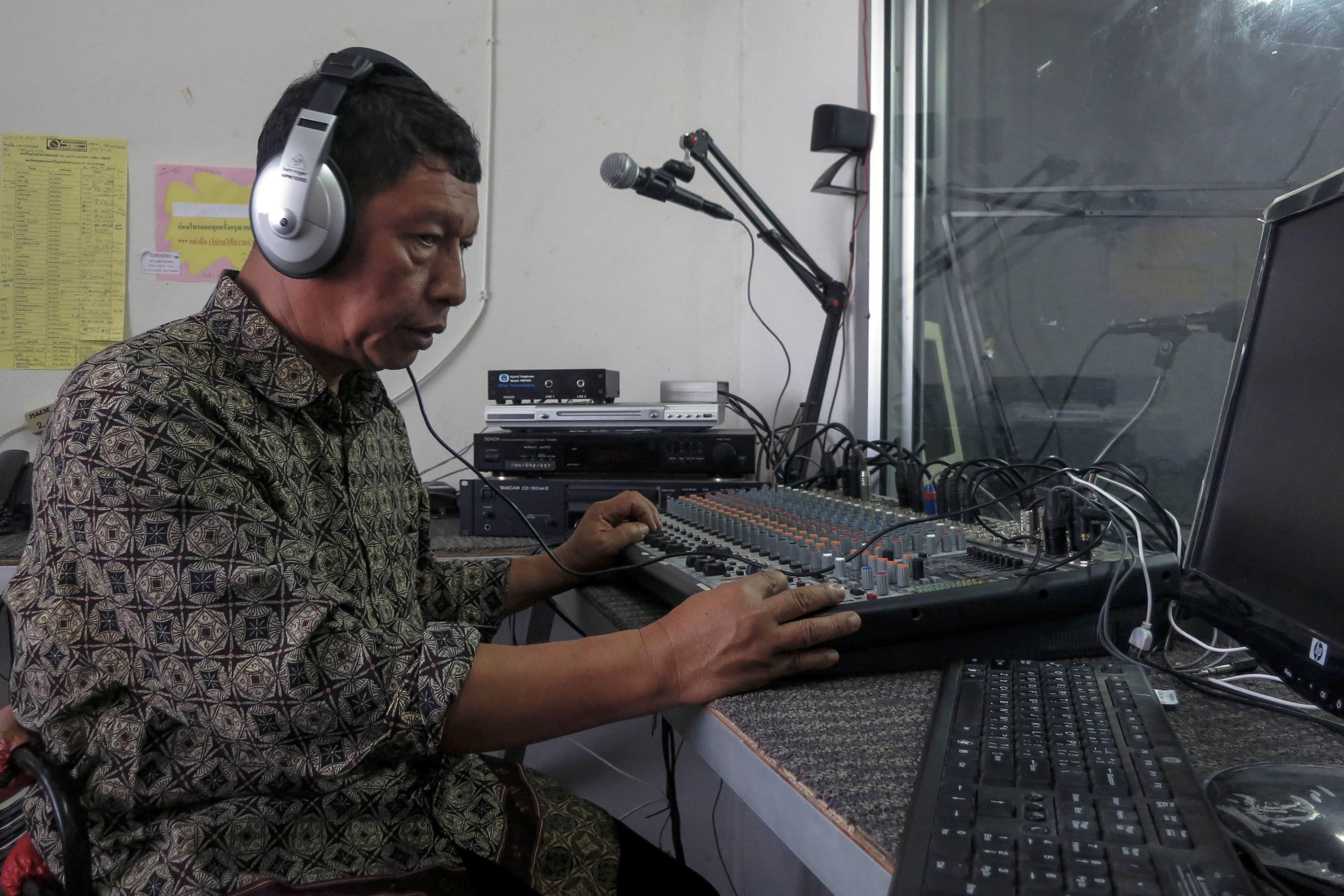 Wanahmad Wankuejik, director of the community radio station Media Selatan, broadcasts at his studio in Pattani, 5 June 2014, one of three southernmost provinces of Thailand, REUTERS/Andrew RC Marshall