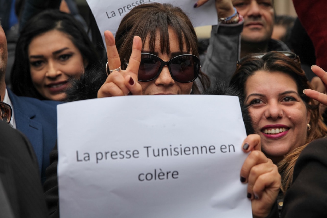 A female Tunisian journalist takes part in the "Tunisian press in anger" action, outside the headquarters of the National Union of Tunisian Journalists (SNJT), in Tunis, 2 February 2018, Chedly Ben Ibrahim/NurPhoto via Getty Images