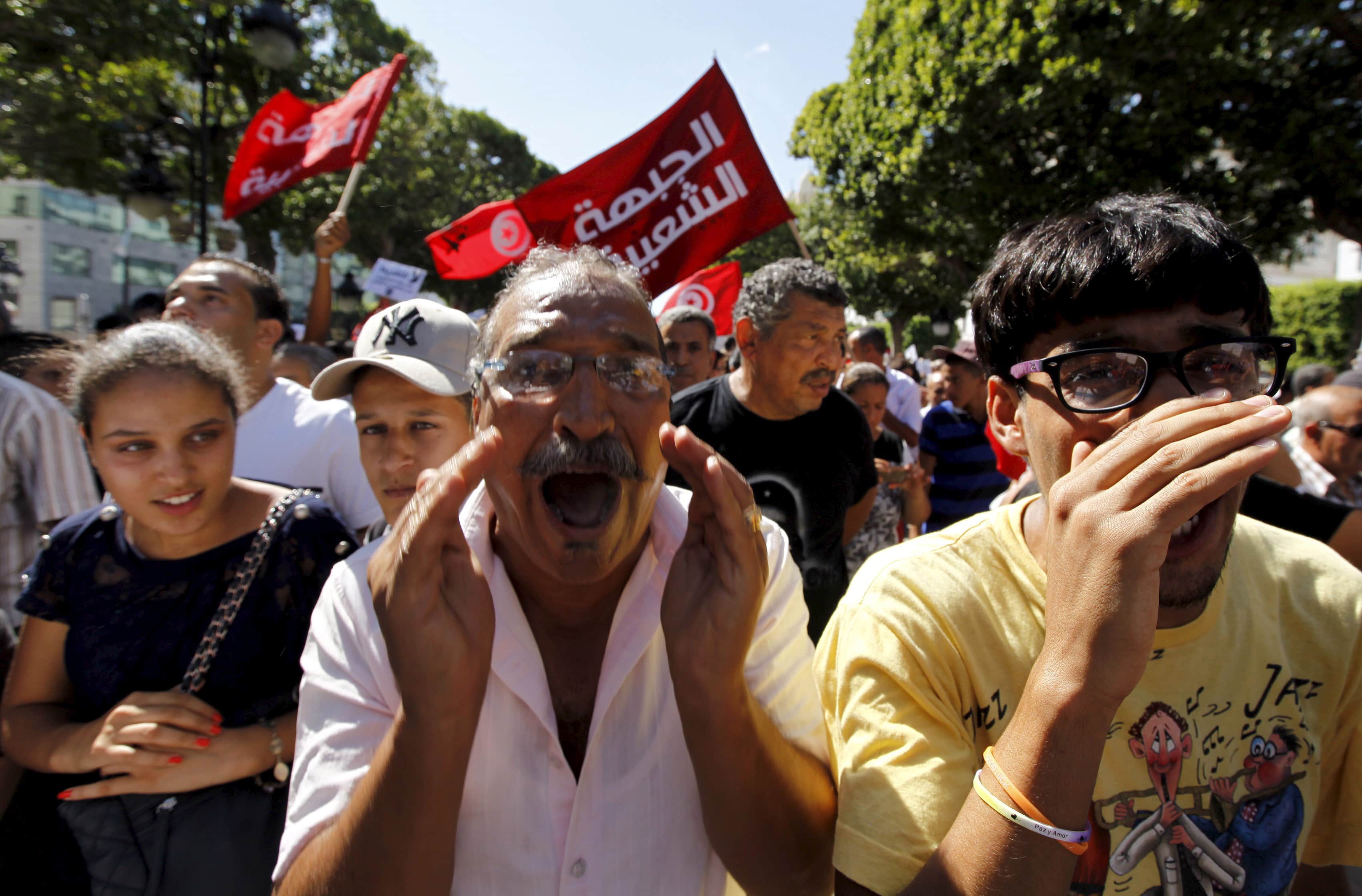 Protesters shout slogans during a demonstration in Tunis, 12 September 2015, REUTERS/Anis Mili