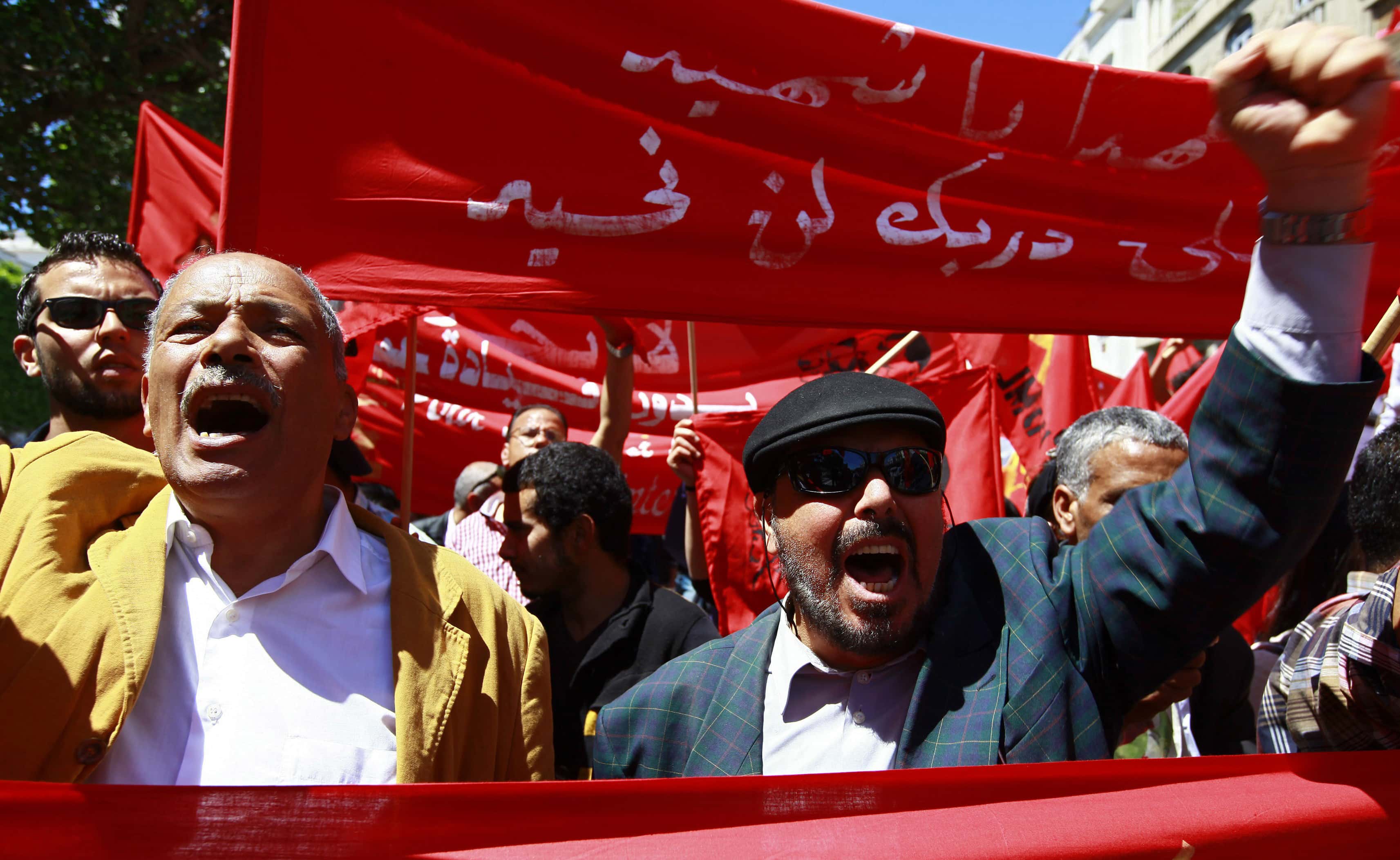 Tunisians march to commemorate International Workers' Day, or Labour Day, on Avenue Habib Bourguiba in Tunis on 1 May 2014, REUTERS/Anis Mili
