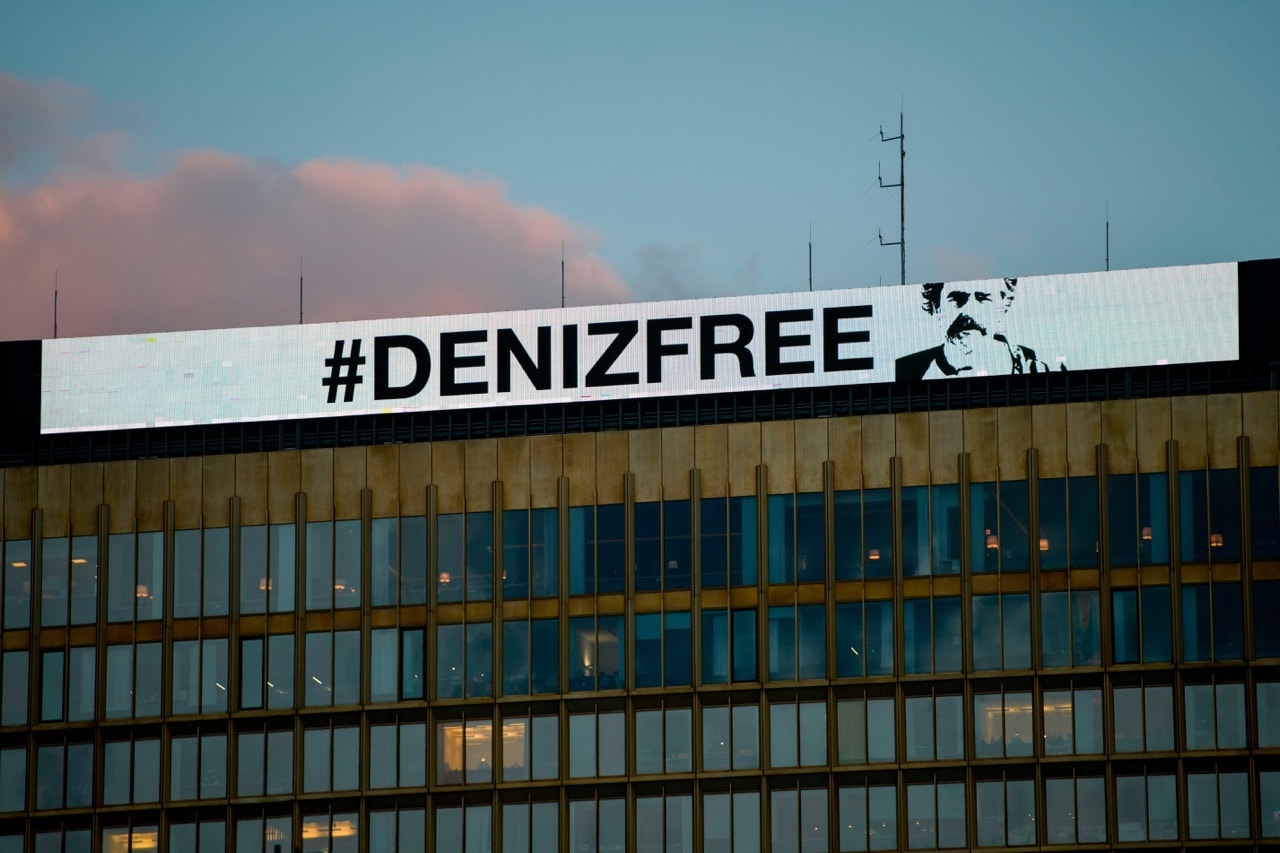 An inscription reading 'Denizfree' is seen at the headquarters of German newspaper "Die Welt" in Berlin, on 16 February 2018, after Turkey released German-Turkish journalist Deniz Yucel from prison, STEFANIE LOOS/AFP/Getty Images