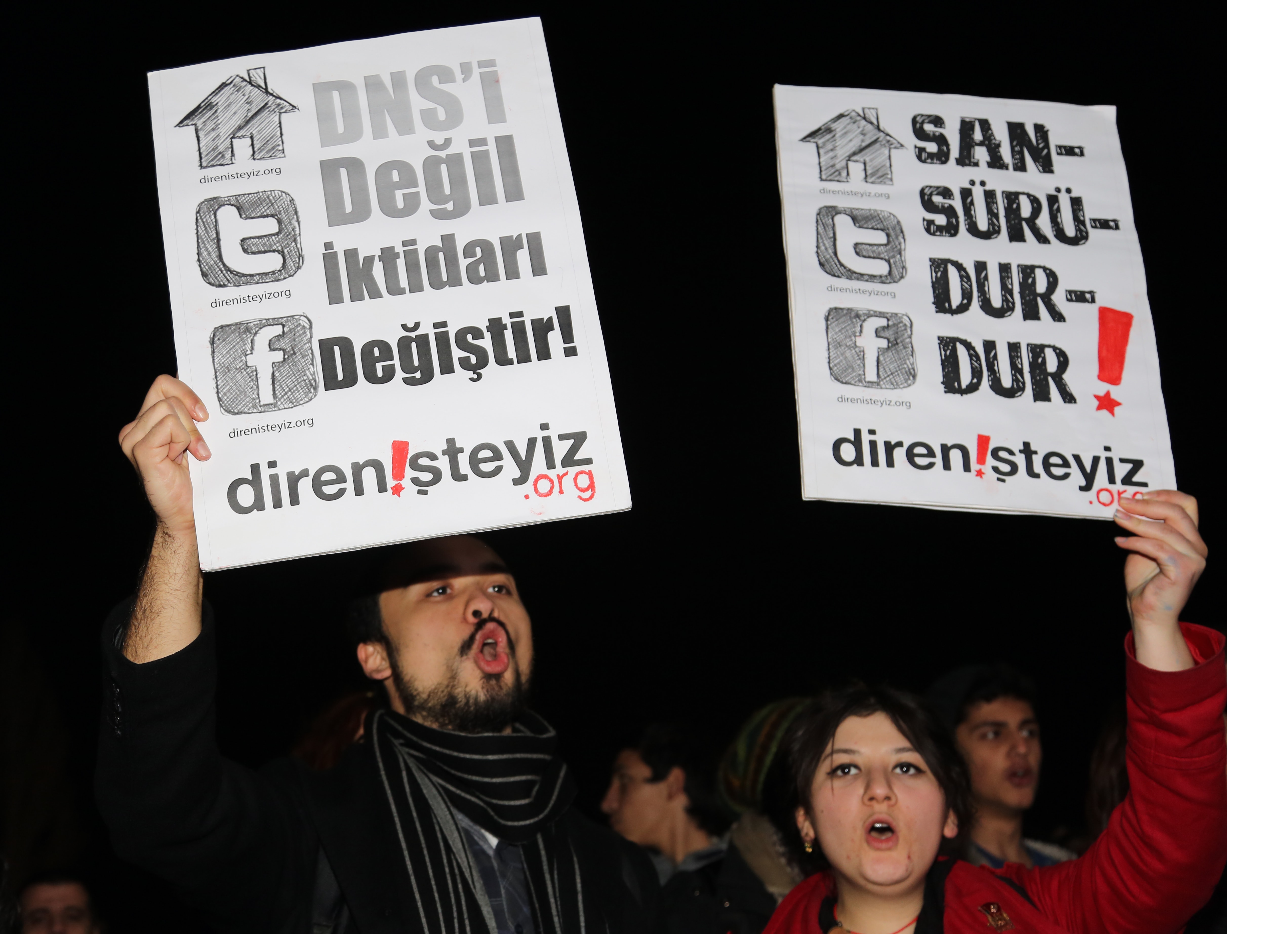 People hold placards that read "stop censorship " in Ankara, 18 January 2014. , AP Photo/Burhan Ozbilici