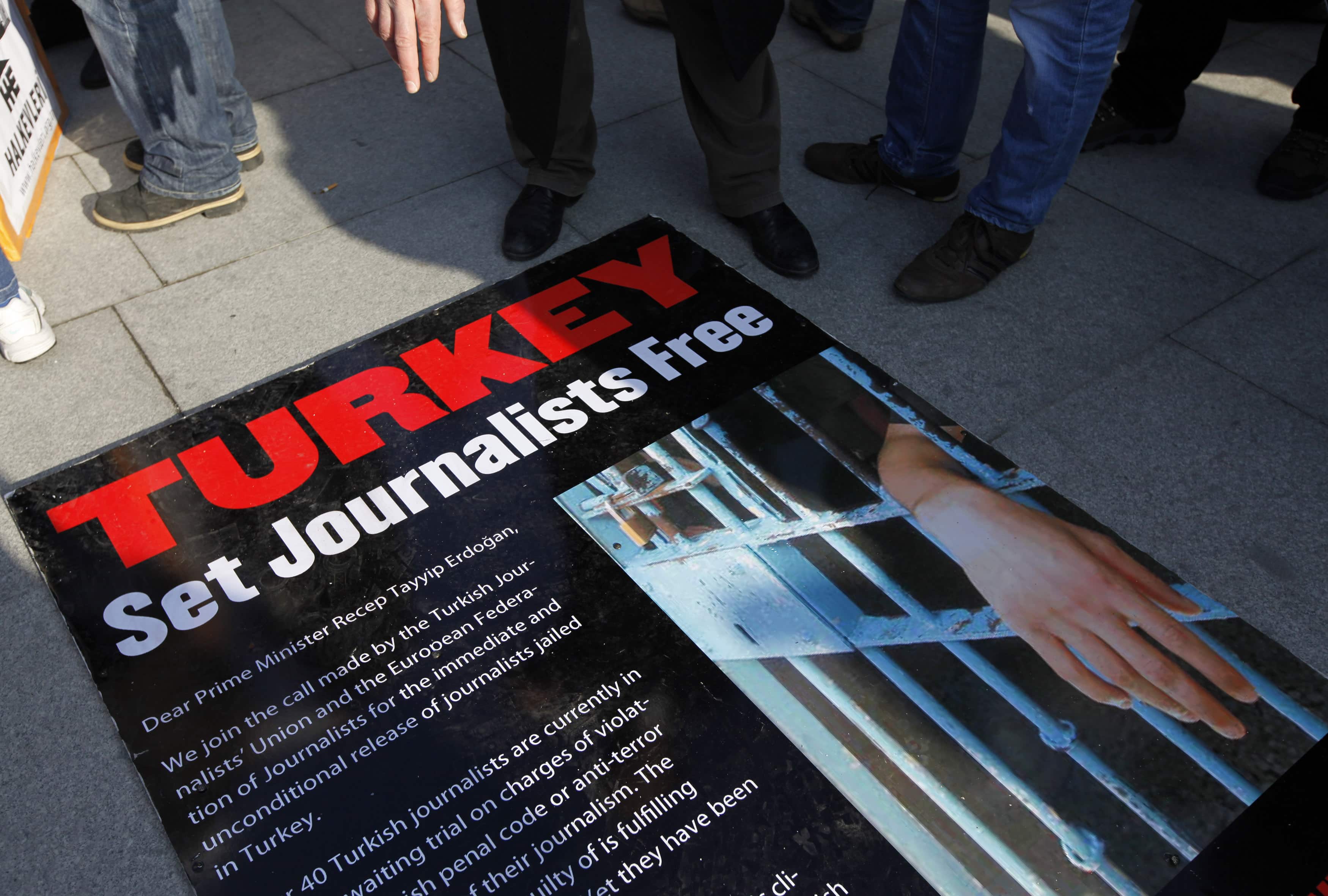 In December 2011, people gathered outside the Justice Palace in Istanbul to protest the detention of journalists; CPJ reports that at least 49 journalists remain jailed in Turkey at the end of 2012, Murad Sezer / Reuters