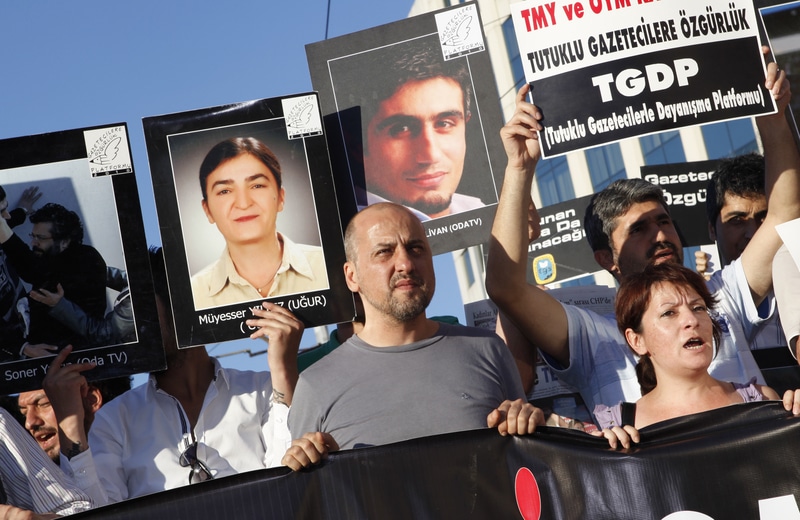 During an 8 June 2012 march in Istanbul, journalist Ahmet Sık and others call for their colleagues' freedom, DEMOTIX/Fulya Atalay