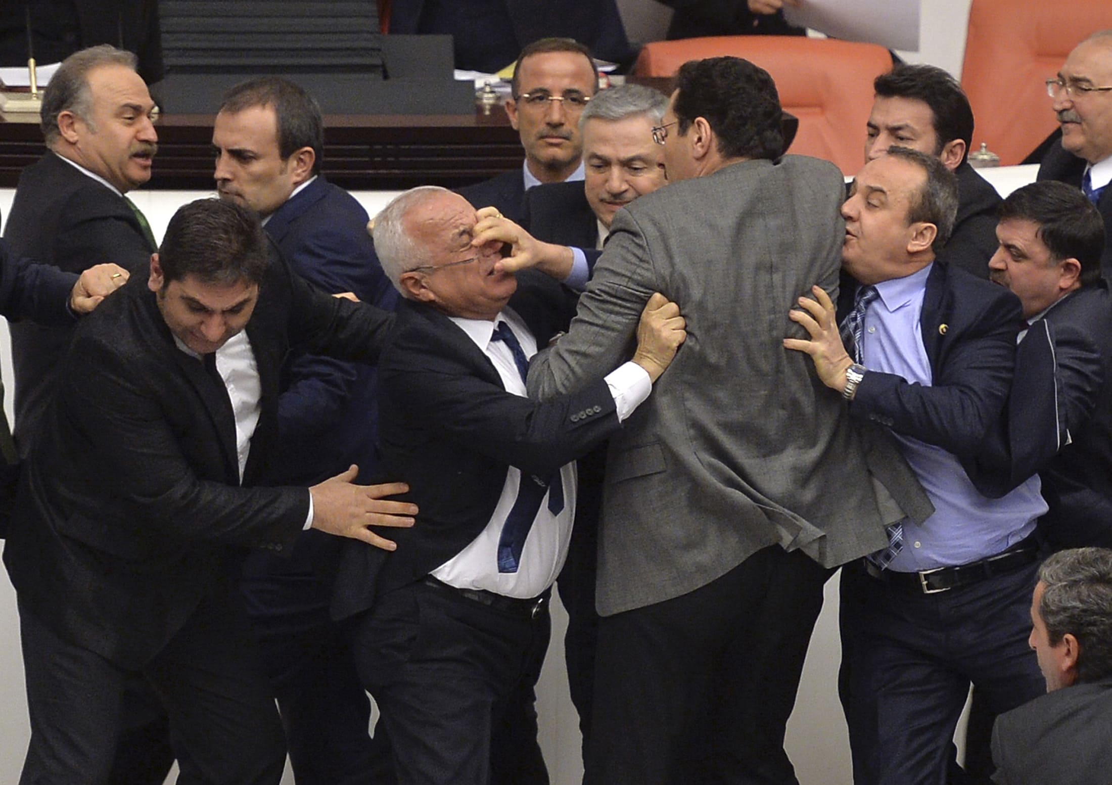 Lawmakers from the main opposition Republican People's Party and ruling AK Party scuffle during a debate on a legislation to boost police powers, 19 February 2015, REUTERS/Stringer