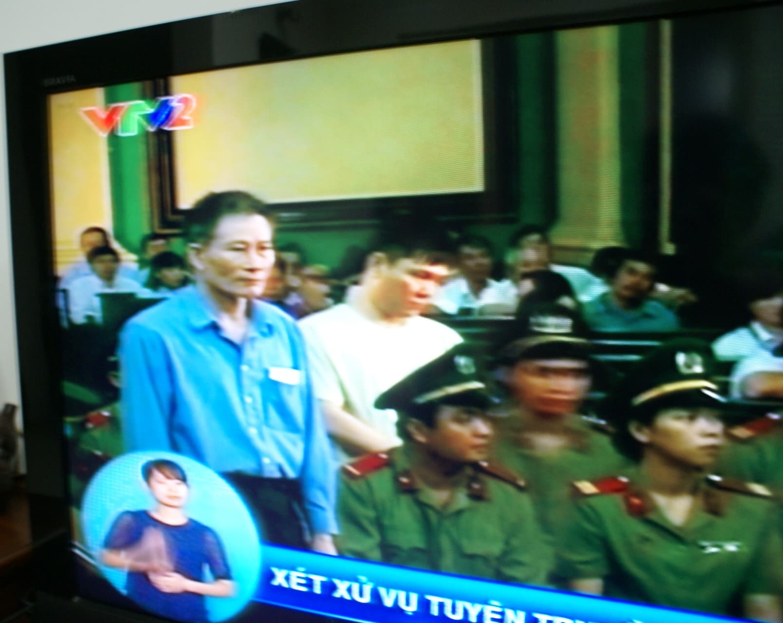 Blogger Dieu Cay and his co-defendants appear before a Ho Chi Minh City court, Free Journalists Network of Vietnam