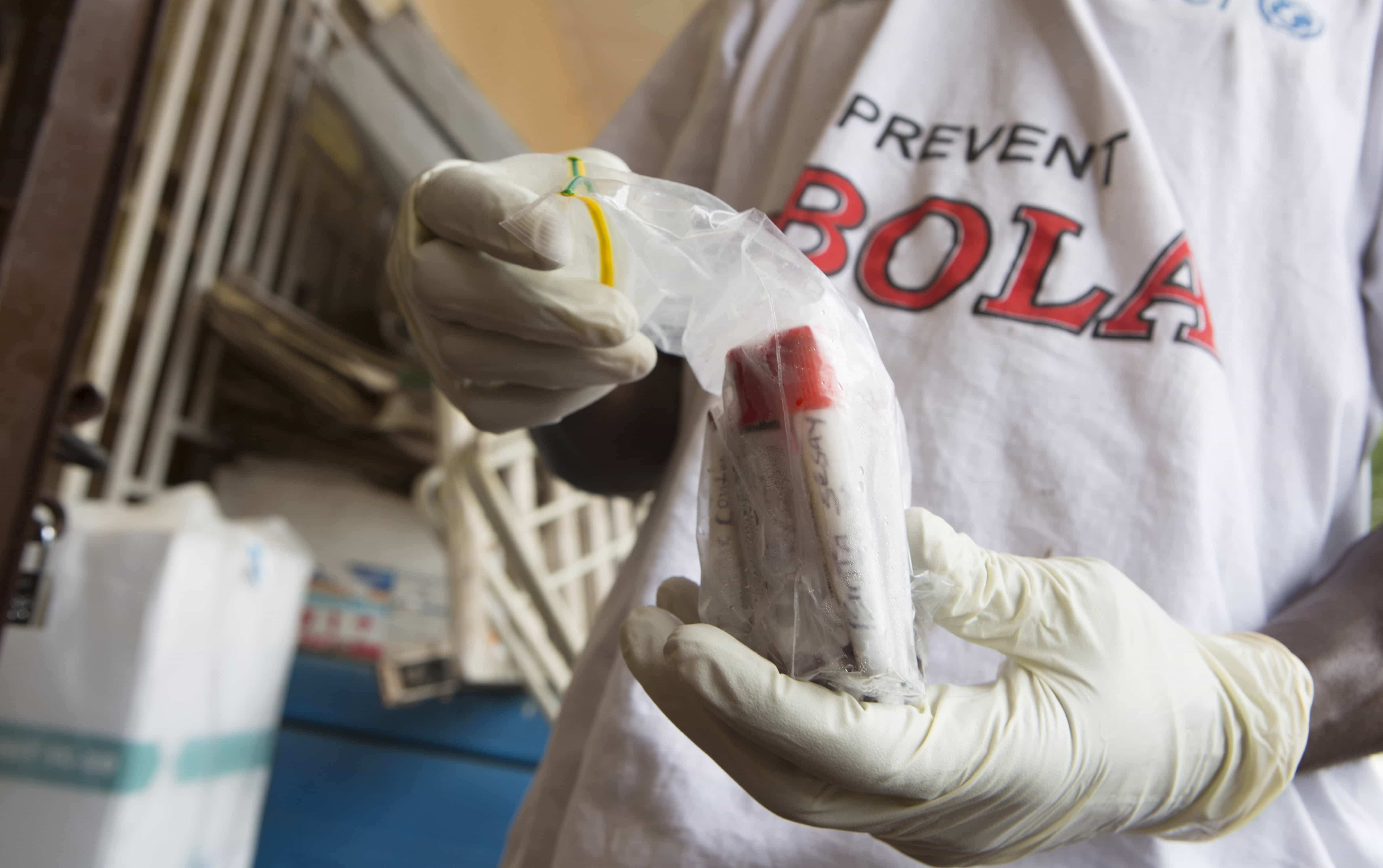 Blood samples from patients suspected of having the Ebola virus disease are prepared for transportation to Freetown for testing, at Port Loko, Sierra Leone, 27 September 2014, REUTERS/Christopher Black/WHO/Handout via Reuters