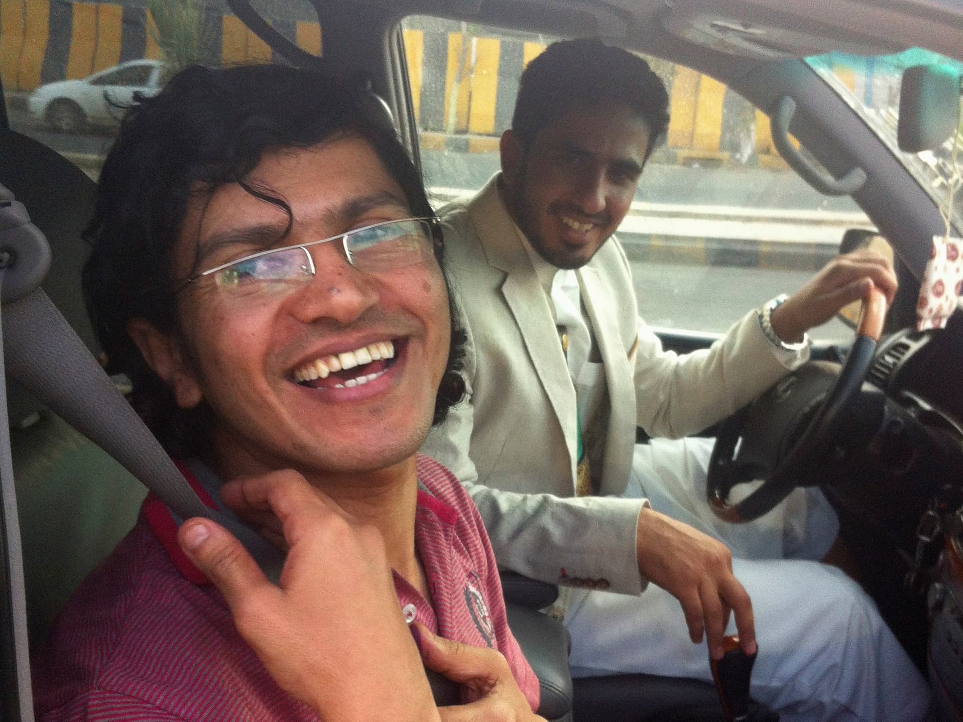 Journalist Abdul-Elah Haider Shaye smiles broadly following his release from jail in Sanaa on 23 July 2013, REUTERS/Farouq al-Sharani