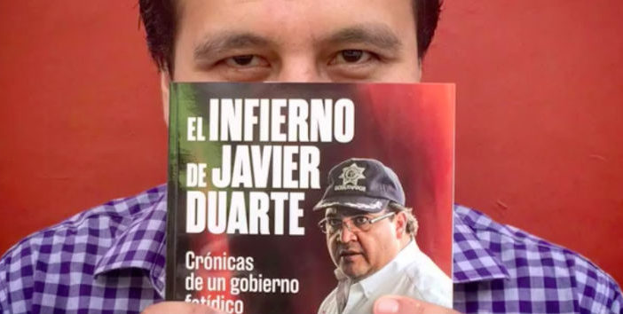 Noe Zavaleta with his new book 'Javier Duarte's Hell', PEN International