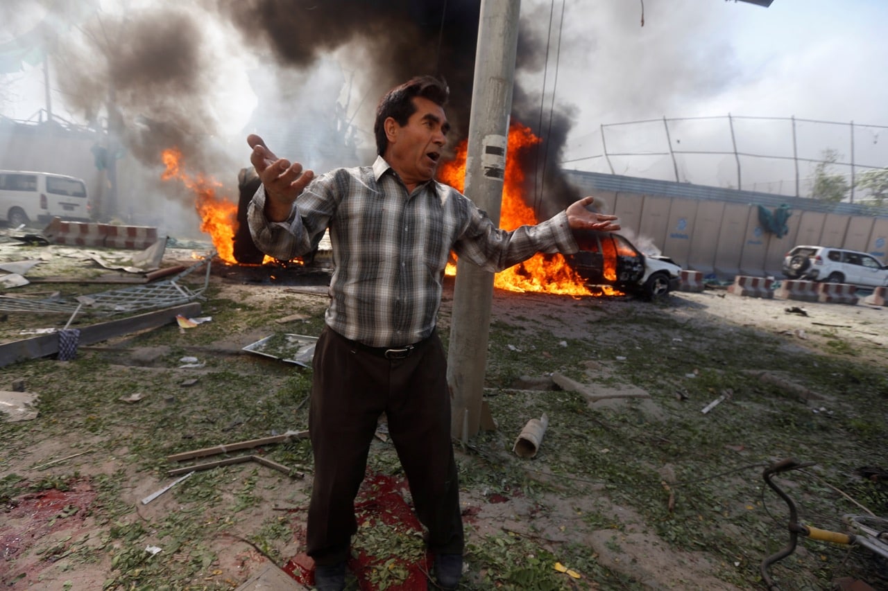 A man reacts at the site of the blast in Kabul, Afghanistan, 31 May 2017, REUTERS/Omar Sobhani