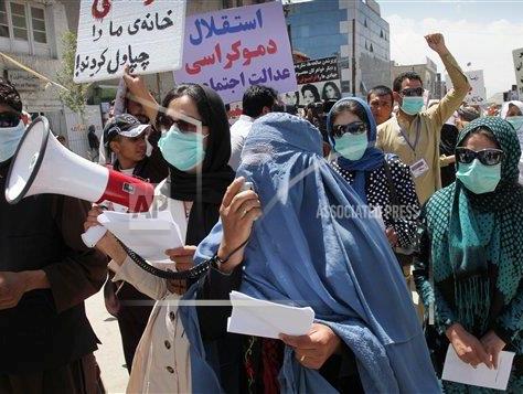 Supporters of Afghanistan's Solidarity Party during a march in Kabul in April 2012, AP Photo/Musadeq Sadeq