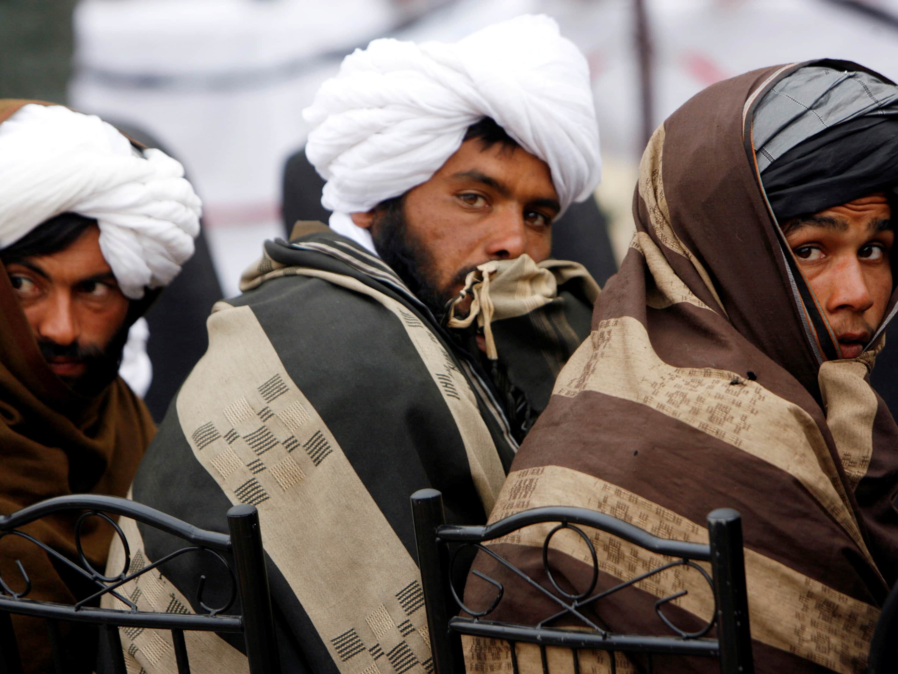 Taliban threats against Afghan journalists have been increasing in recent months; in this photo, Taliban look on after handing over their weapons as part of a reconciliation and reintegration programme in Herat province, February 2013, REUTERS/Mohmmad Shoib