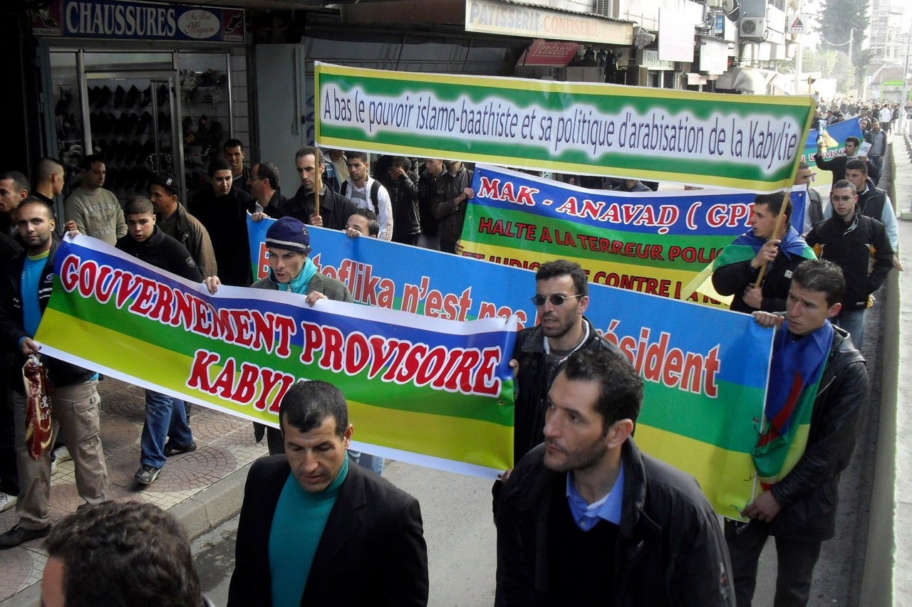 Members of the Kabyle ethnic minority march to demand greater autonomy from the Algerian authorities, in Tizi Ouzou, eastern Algeria, 12 January 2011, AP Photo