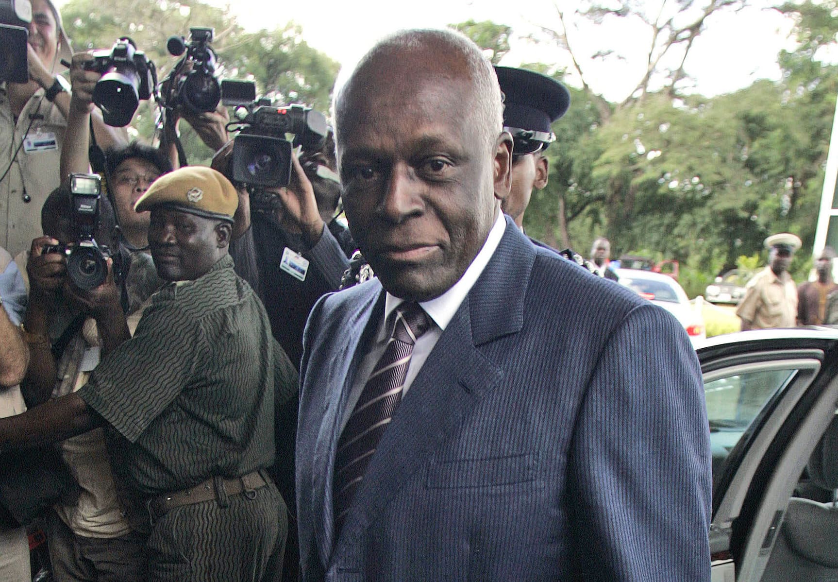 Angola's main opposition party is calling for President Jose Eduardo dos Santos to step down because of his alleged responsibility for the killing of two activists., AP Photo/Themba Hadebe, File