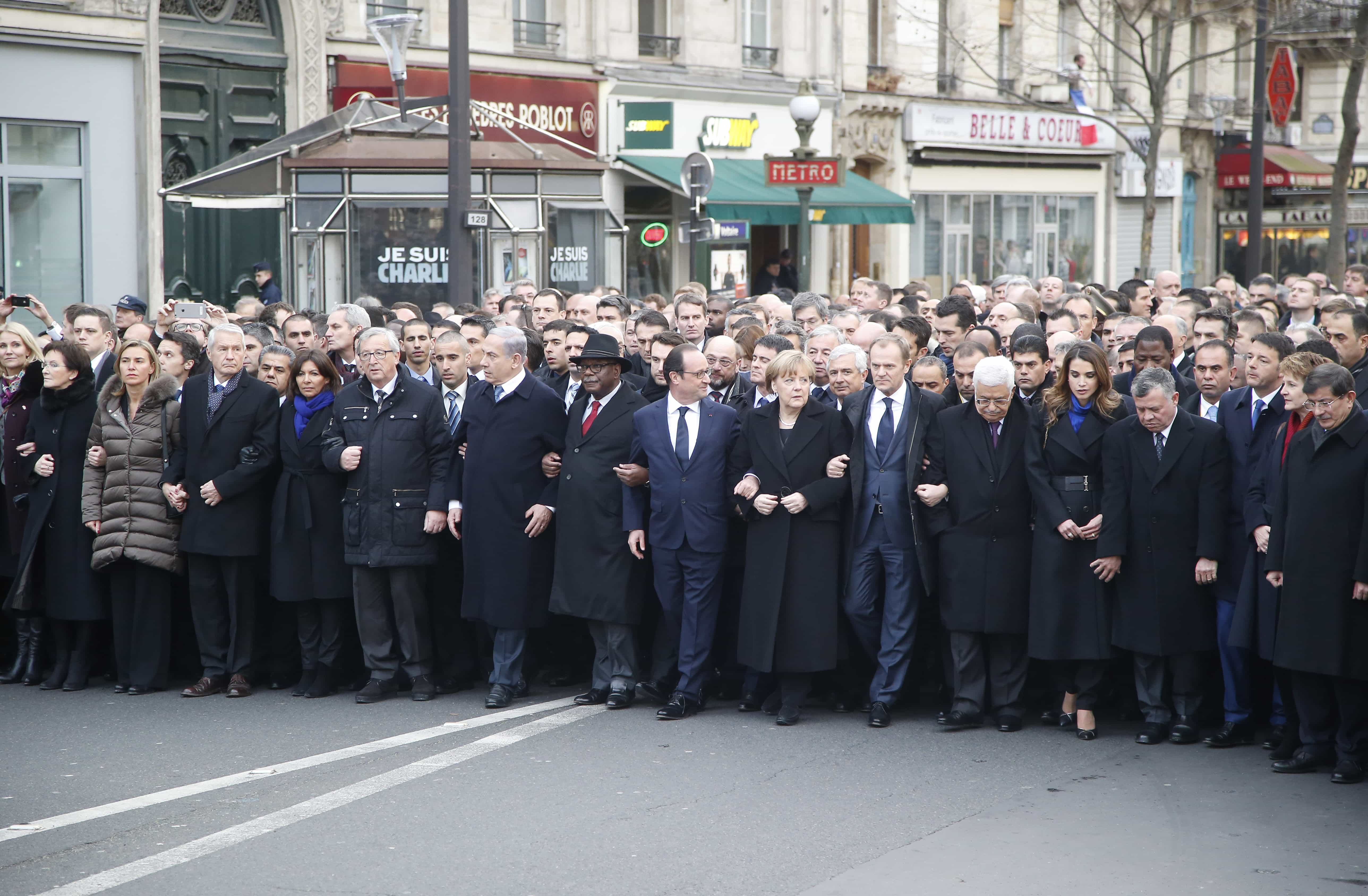 World leaders linked arms to lead more than a million French citizens through Paris in a march to pay tribute to victims of the Charlie Hebdo attacks, AP Photo/Michel Euler