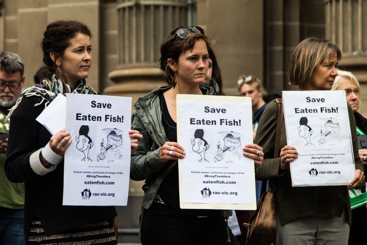 Campaigners for cartoonist Ali Dorani (Mr. Eaten Fish) demand he be allowed into Australia for medical care during a protest in Melbourne, Australia, 18 February 2017,  Asanka Brendon Ratnayake/Anadolu Agency/Getty Images