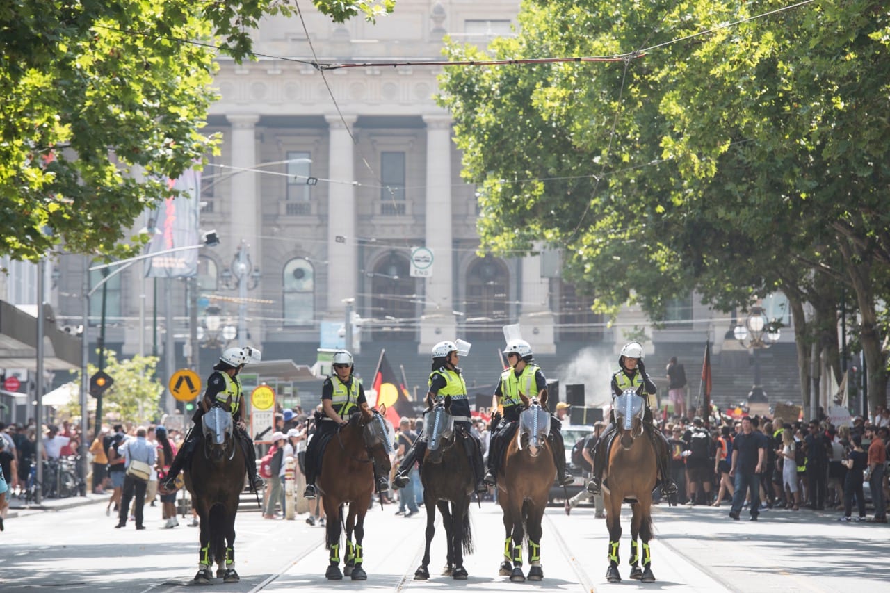 Mounted police keep order as protestors gather at State Parliament in Melbourne, on Australia Day, 26 January 2018, James D. Morgan/Getty Images