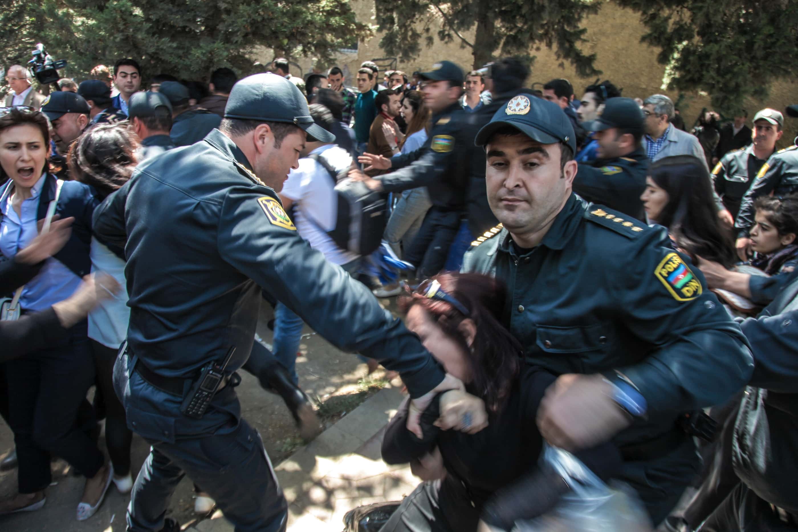 In this photo taken on 6 May 2014, police detain youth opposition supporters protesting against sentences to eight opposition activists in Baku, Azerbaijan. , AP Photo/Aziz Karimov