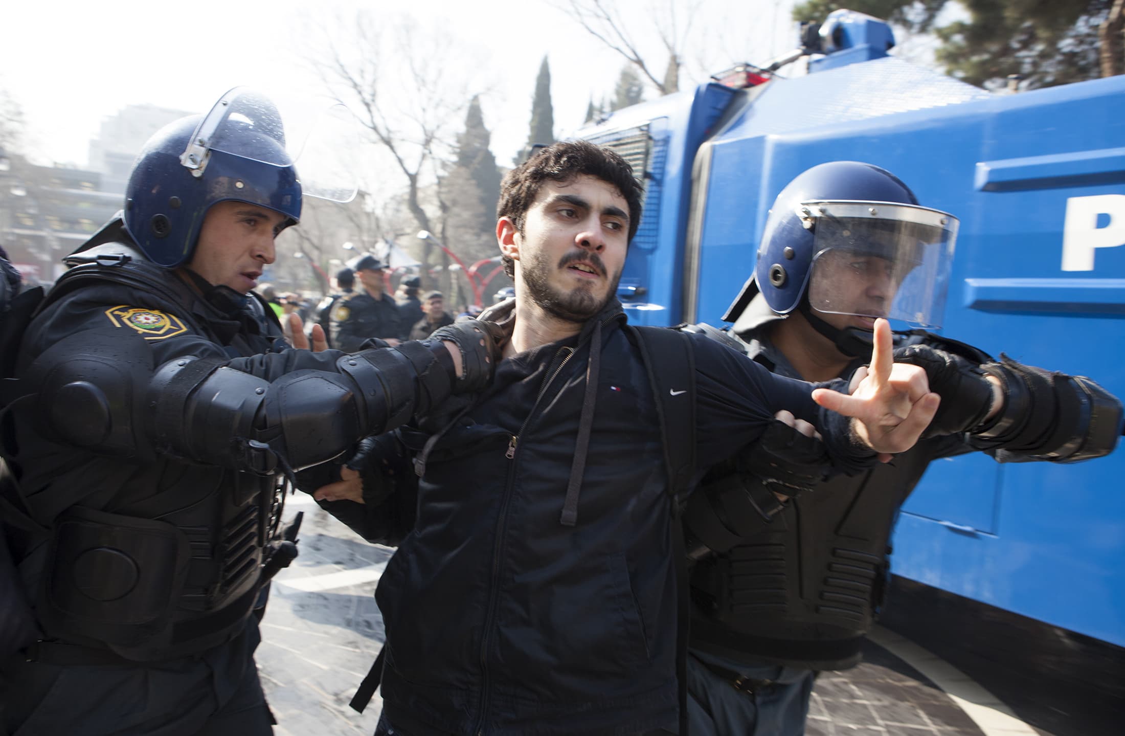 Riot police detain a protester during a rally in Baku, 10 March 2013. , REUTERS/Elmar Mustafazadeh