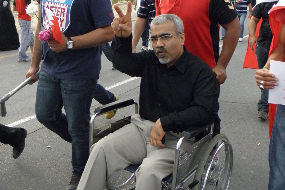 Abduljalil al-Singace taking part in a march at the royal court in Riffa, Bahrain, 11 March 2011, Mohamed CJ [CC BY-SA 3.0 (https://creativecommons.org/licenses/by-sa/3.0)], from Wikimedia Commons