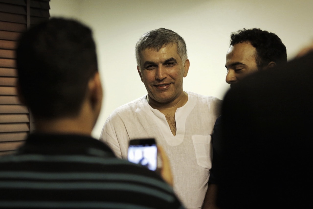 Bahraini human rights activist Nabeel Rajab (C) is greeted by relatives at his home in the village of Bani Jamrah, west of Manama, on 14 July 2015, after his release from prison, MOHAMMED AL-SHAIKH/AFP/Getty Images