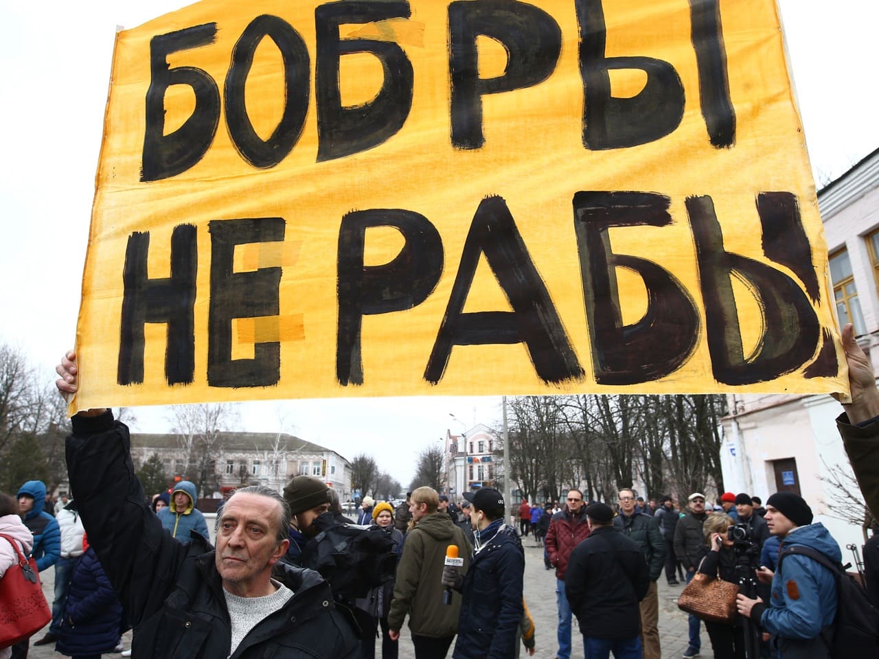People protest against increased tariffs for communal services in Babruysk, Belarus, 12 March 2017; the placard reads, "Beavers (a nickname for residents of Babruysk) are not slaves", REUTERS/Vasily Fedosenko