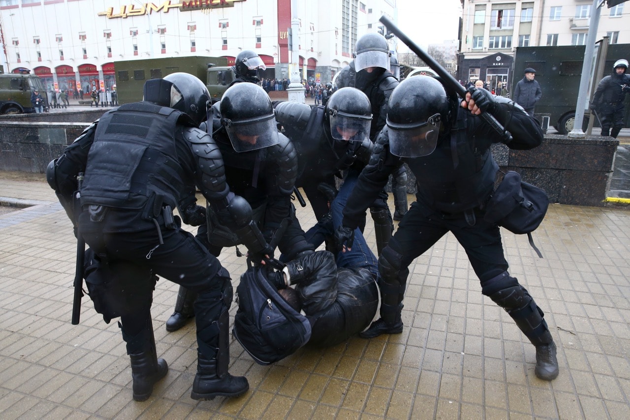 Law enforcement officers detain a participant of a rally, denouncing the new tax on those not in full-time employment, in Minsk, Belarus, 25 March 2017, REUTERS/Vasily Fedosenko