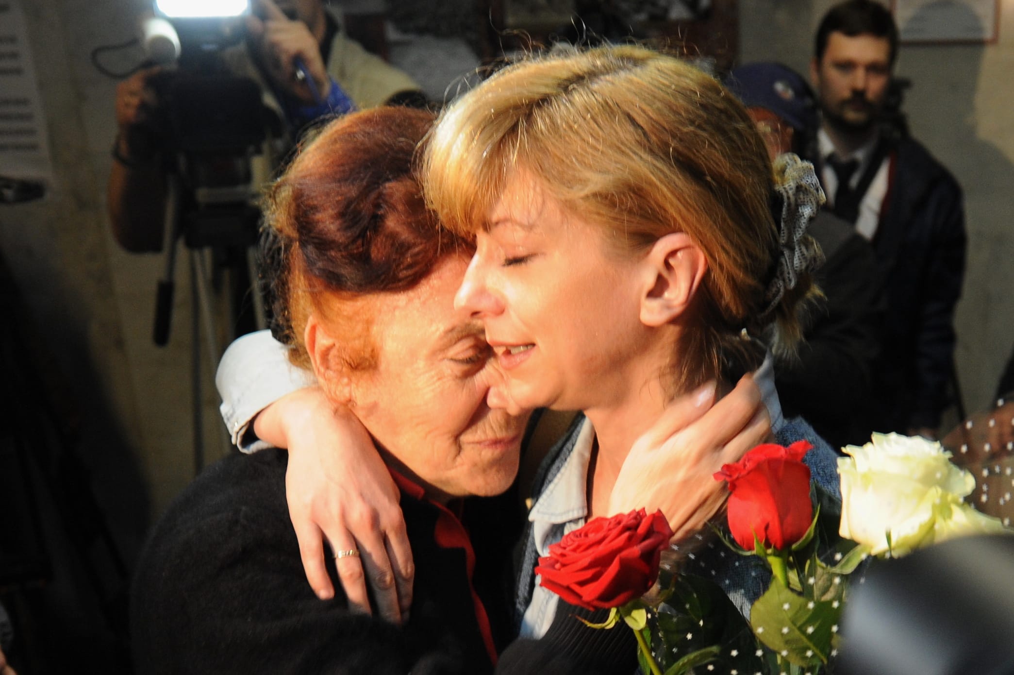 Iryna Khalip hugs her mother-in-law after being handed a 2-year suspended prison sentence in May 2011., Kseniya Avimova/Demotix