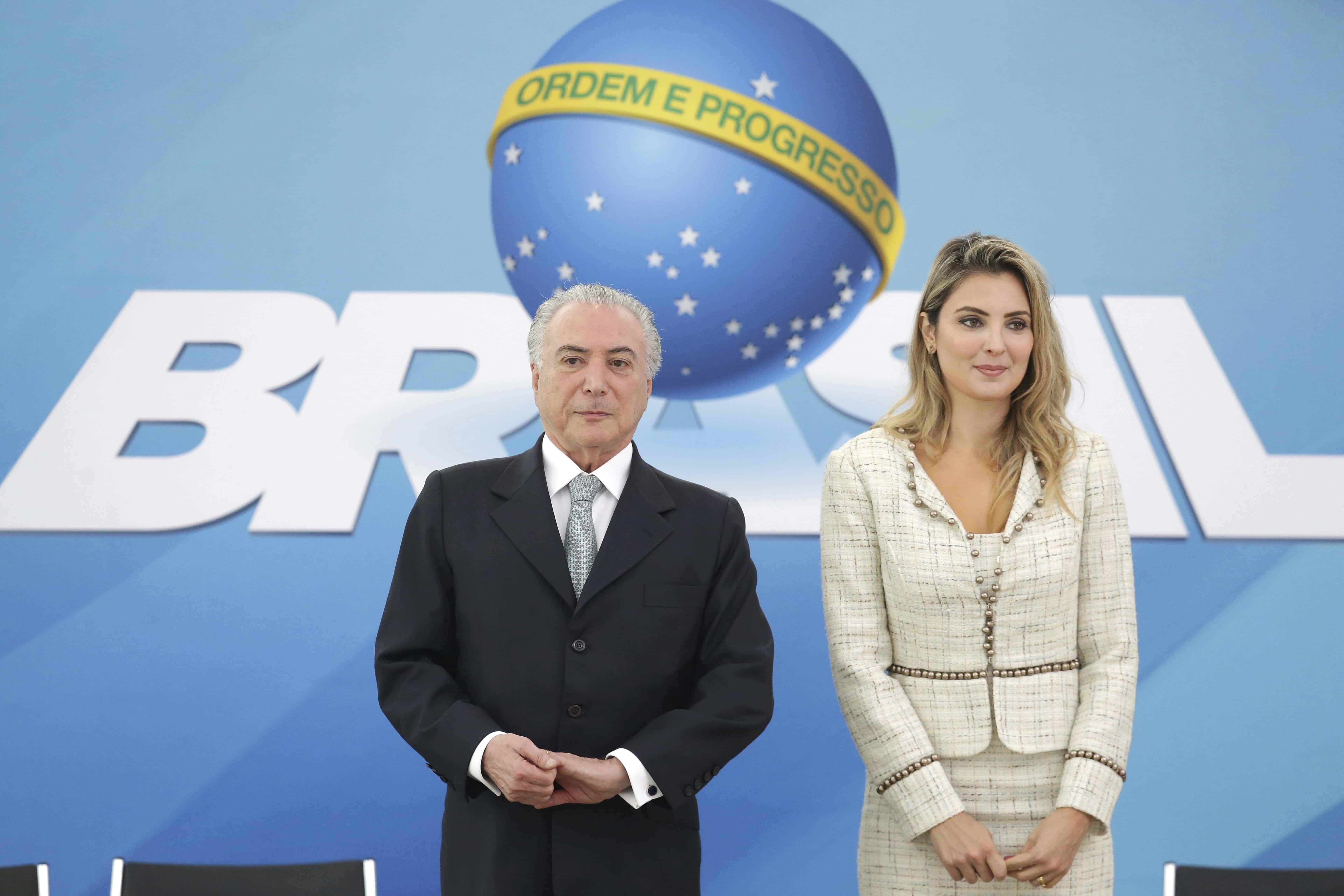 Brazil's President Michel Temer and wife Marcela, take part in a ceremony at the Planalto Presidential Palace, in Brasilia, Brazil, 7 December 2016, AP Photo/Eraldo Peres