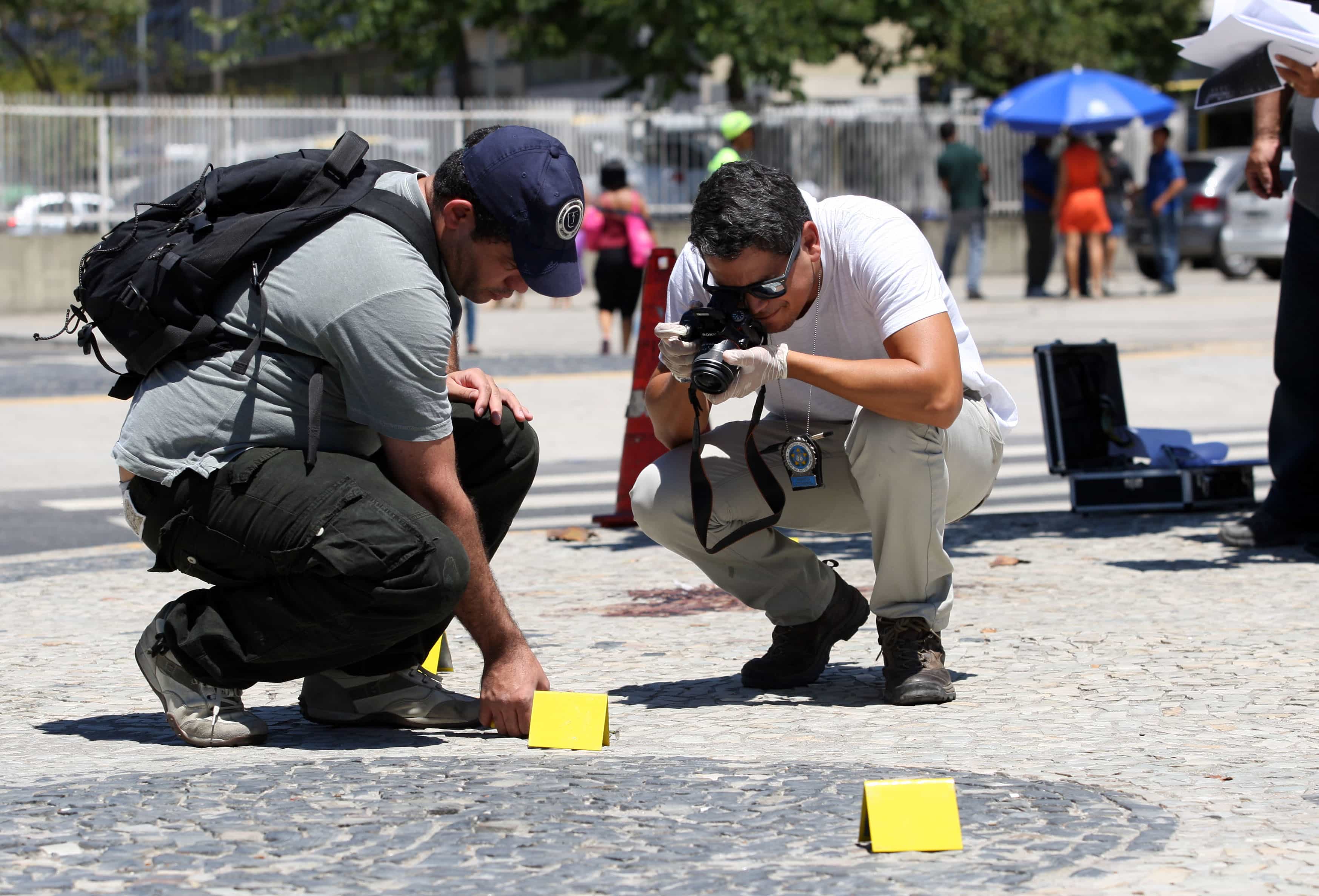 Police investigate in Sao Cristovao, north of Rio de Janeiro, where cameraman Santiago Andrade was hit in the head by fireworks on 6 February 2014, MARCOS ARCOVERDE/ESTADAO CONTEUDO (Agencia Estado via AP Images)