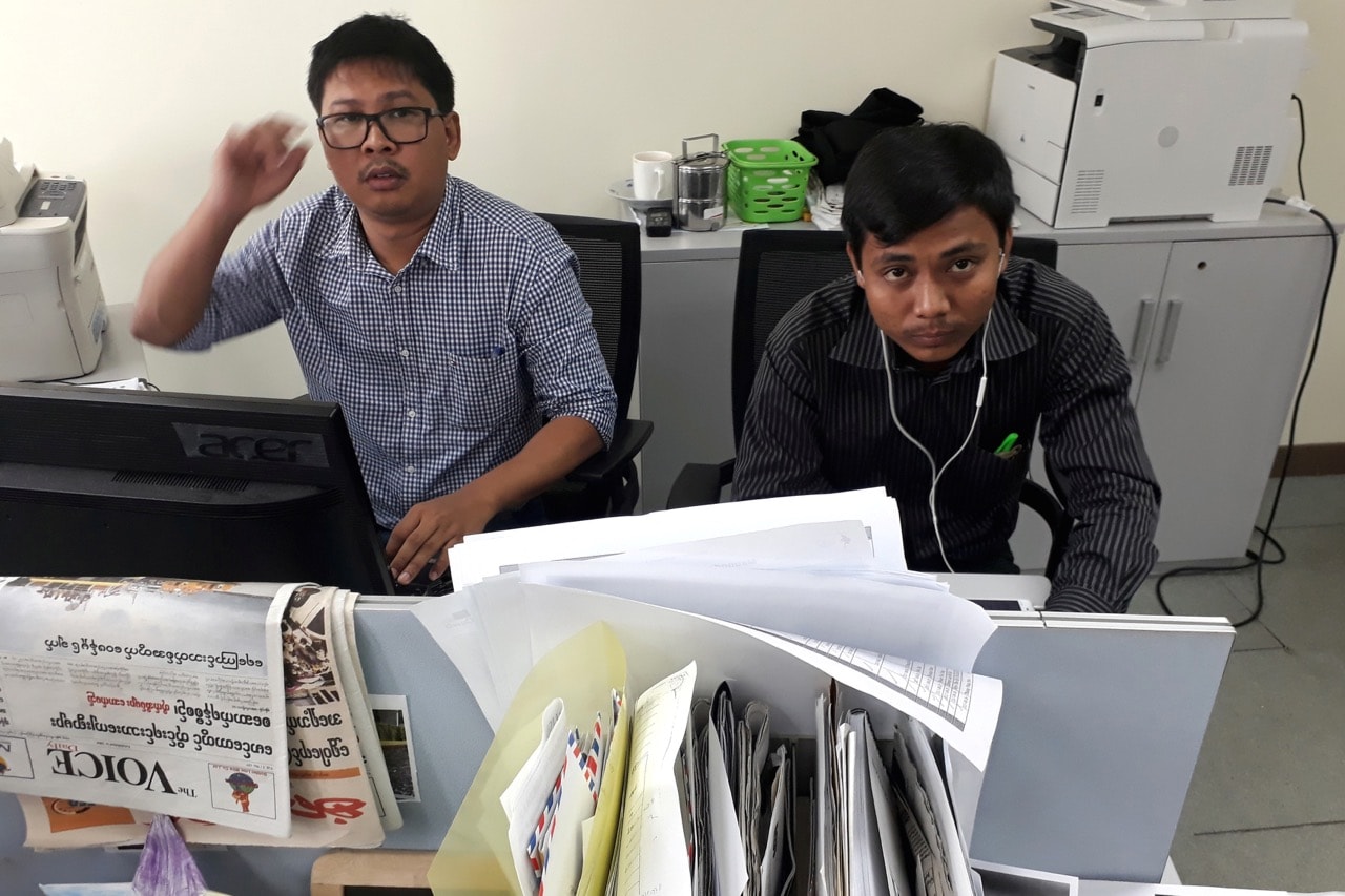 Reuters journalists Wa Lone (L) and Kyaw Soe Oo pose for a picture at the Reuters office in Yangon, Burma, 11 December 2017, REUTERS/Antoni Slodkowski