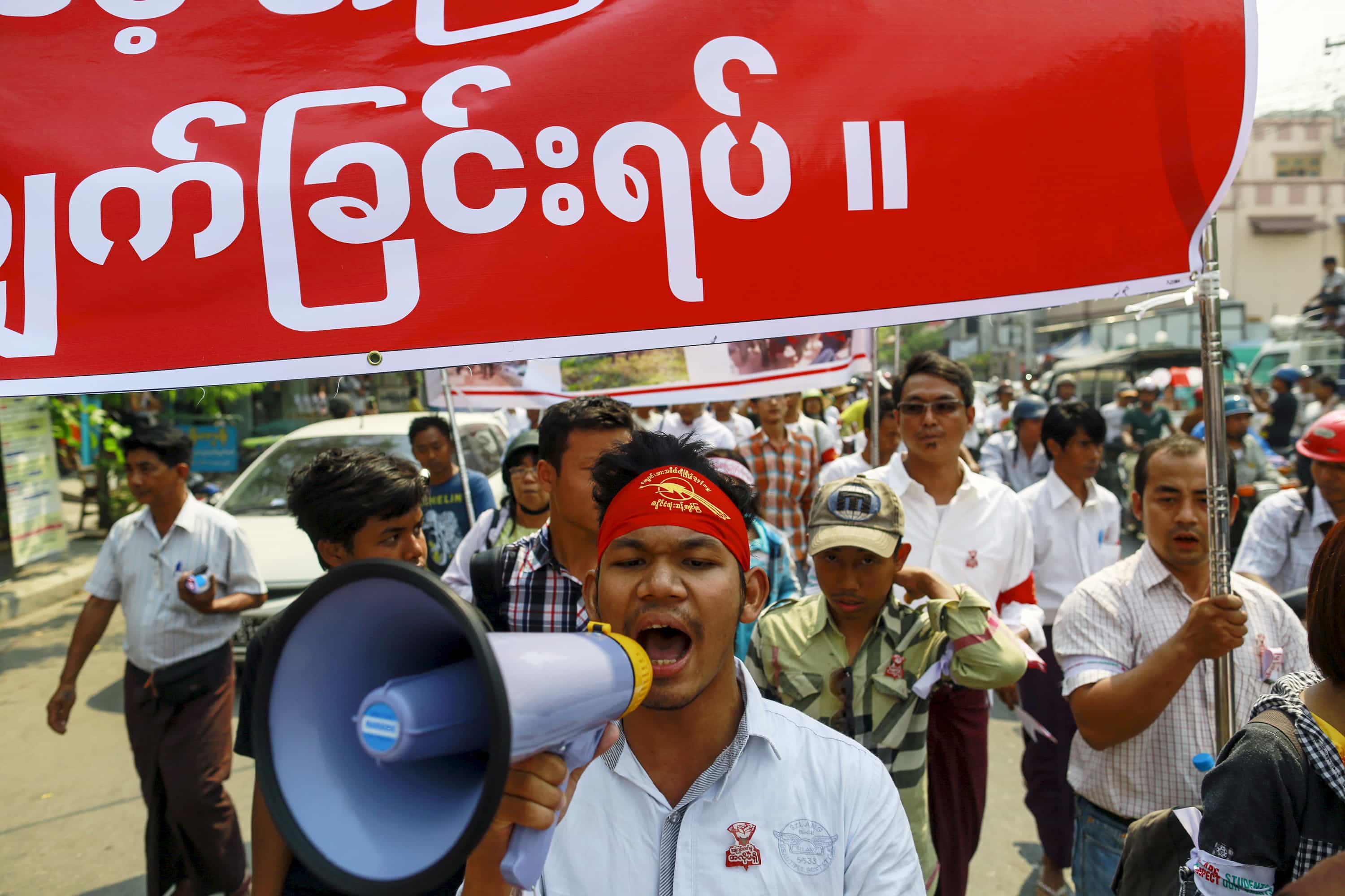 People protest against what they believe to be violence inflicted on students who were demonstrating against an education law at Letpadan on 10 March 2015, in Mandalay, REUTERS/Soe Zeya Tun