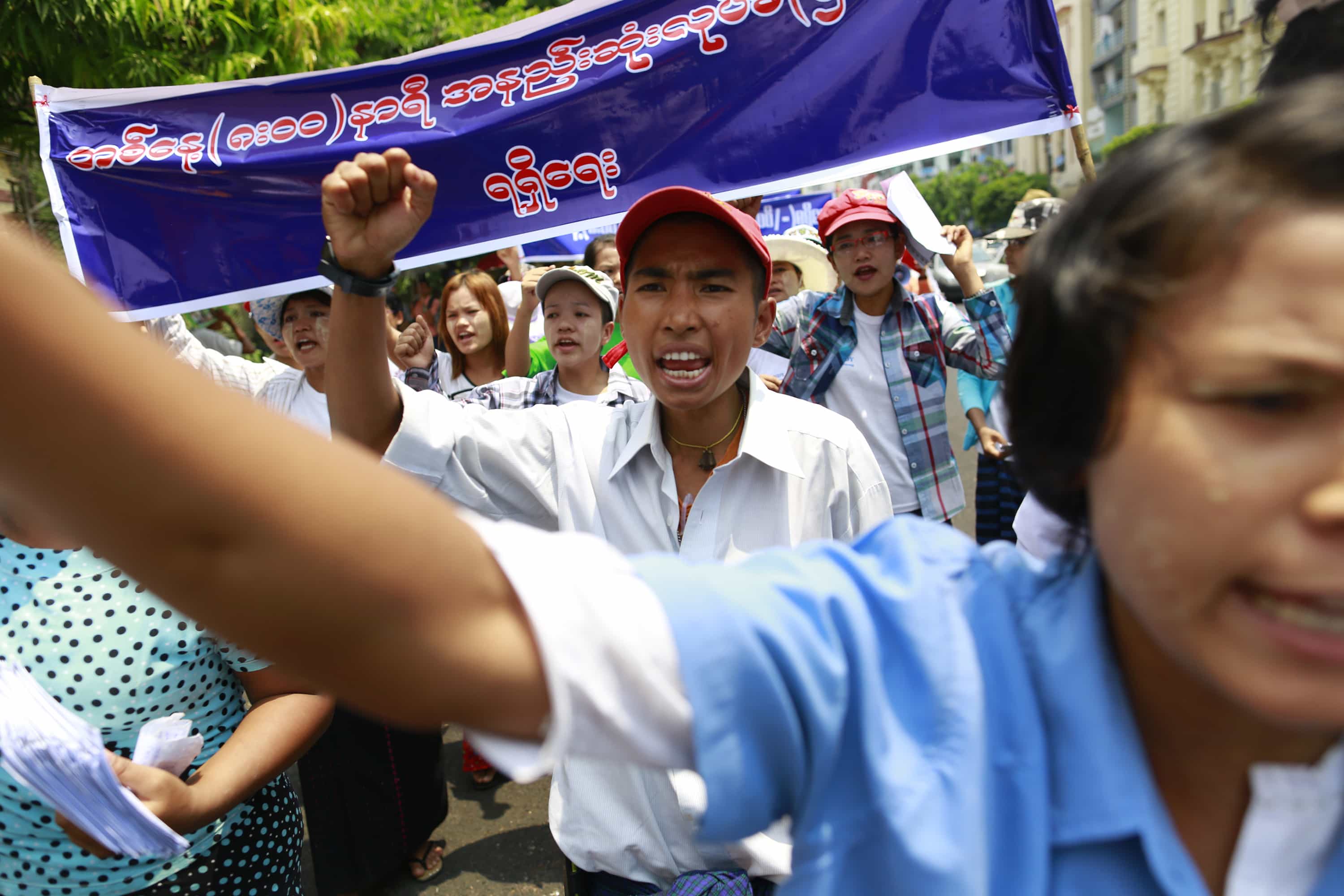 Members of the Myanmar Labour Union march during a May Day protest in central Yangon, 1 May 2014, REUTERS/Soe Zeya Tun