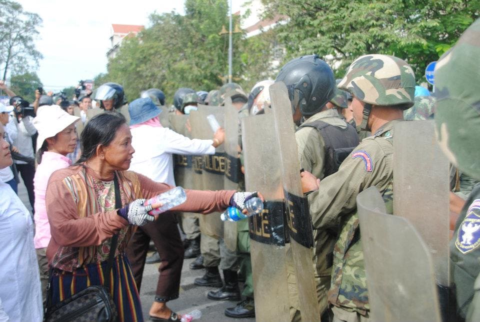 Police force protesters off the road, Cambodian Center for Human Rights