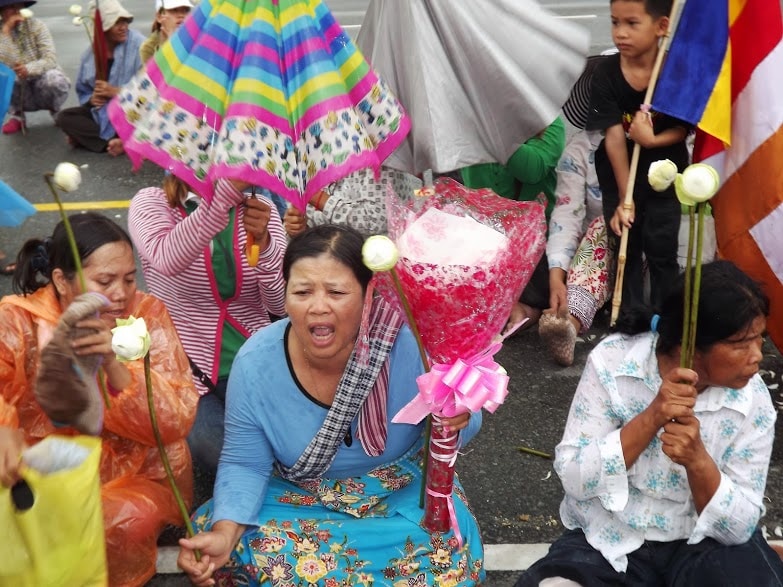 Protesters - mostly women and children - called for the release of activist Yorm Bopha outside the Royal Palace in Phnom Penh, Cambodia before being victimised by the police, Marek Marczynski/Index on Censorship