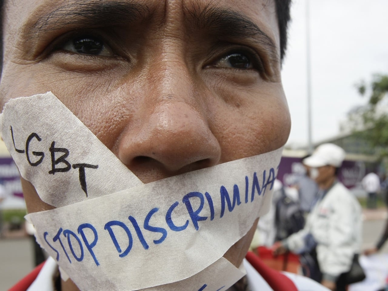 A Cambodian protester calling for an end to discrimination against the LGBT community, in front of the National Assembly, in Phnom Penh, 16 November 2012, AP Photo/Heng Sinith