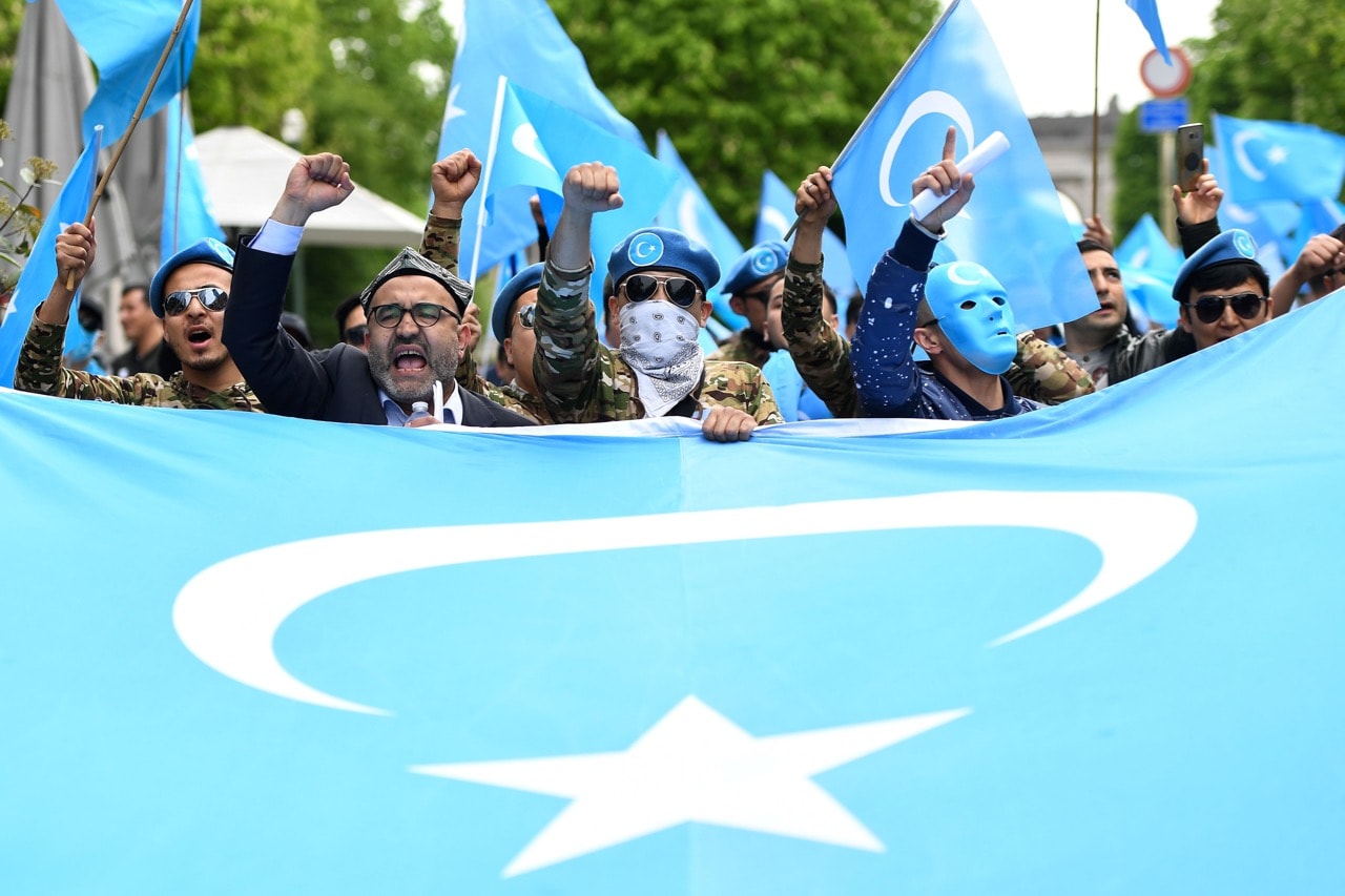 Ethnic Uighurs take part in a protest urging the European Union to call upon China to respect human rights in the Chinese Xinjiang region, in Brussels, Belgium, 27 April 2018, EMMANUEL DUNAND/AFP/Getty Images