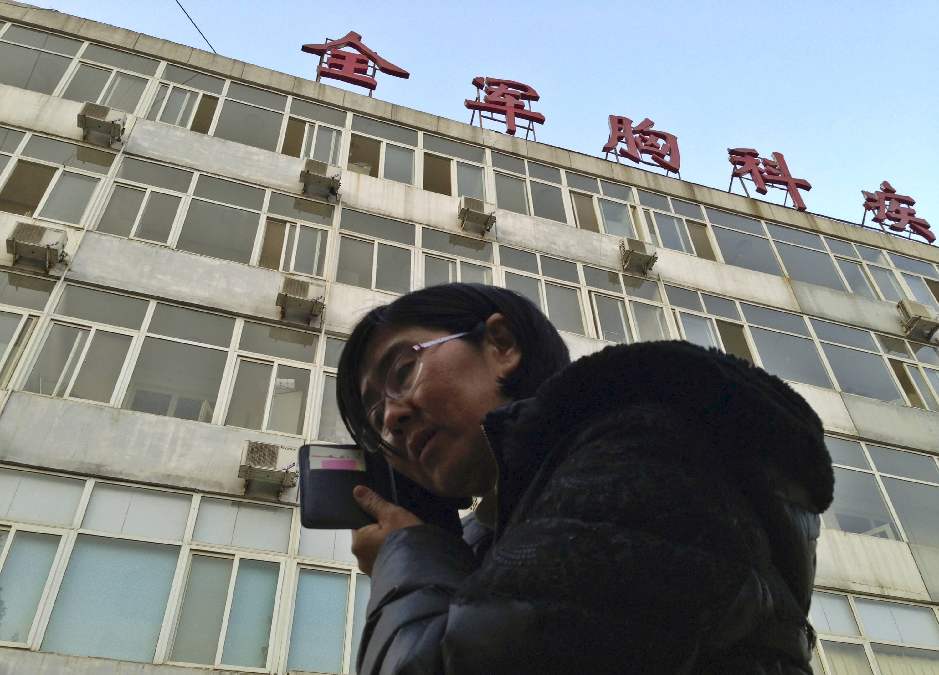 In this March 2014 file photo, Wang Yu, Cao Shunli's lawyer, is pictued in front of a Beijing hospital where Cao was in the intensive care unit at the time, REUTERS/Kim Kyung-Hoon