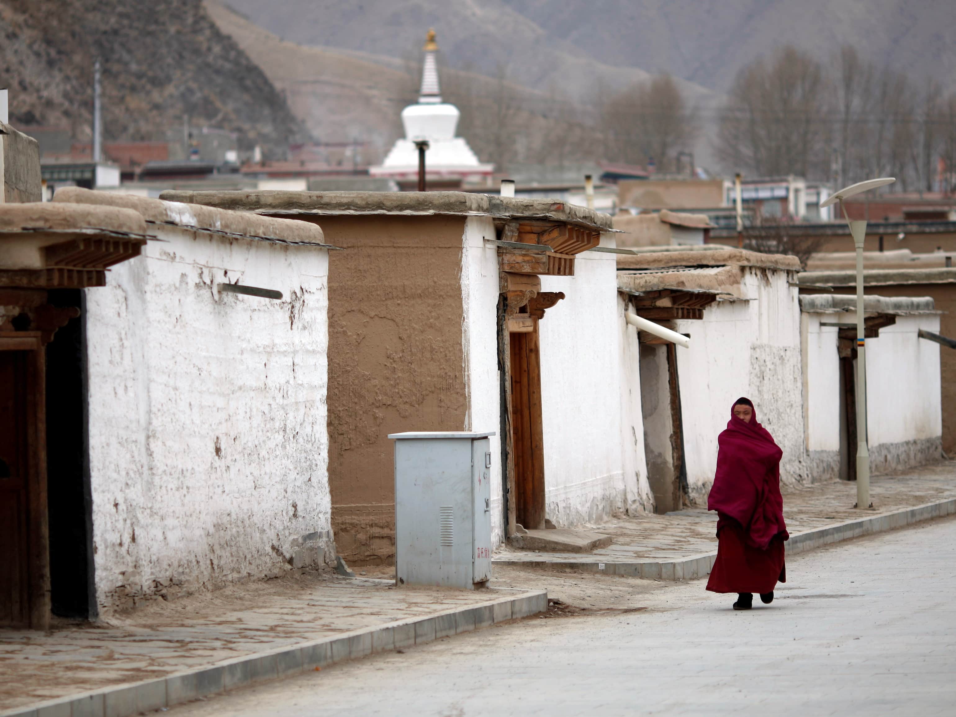A Tibetan monk at Labrang Monastery in Gansu Province, 11 February 2013; China introduced a new system of information gathering to monitor monks and nuns in Tibetan monasteries in 2011, REUTERS/Carlos Barria