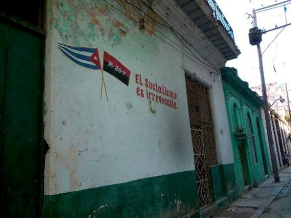 A socialist slogan emblazoned on a building in Havana, Cuba, José Peralta