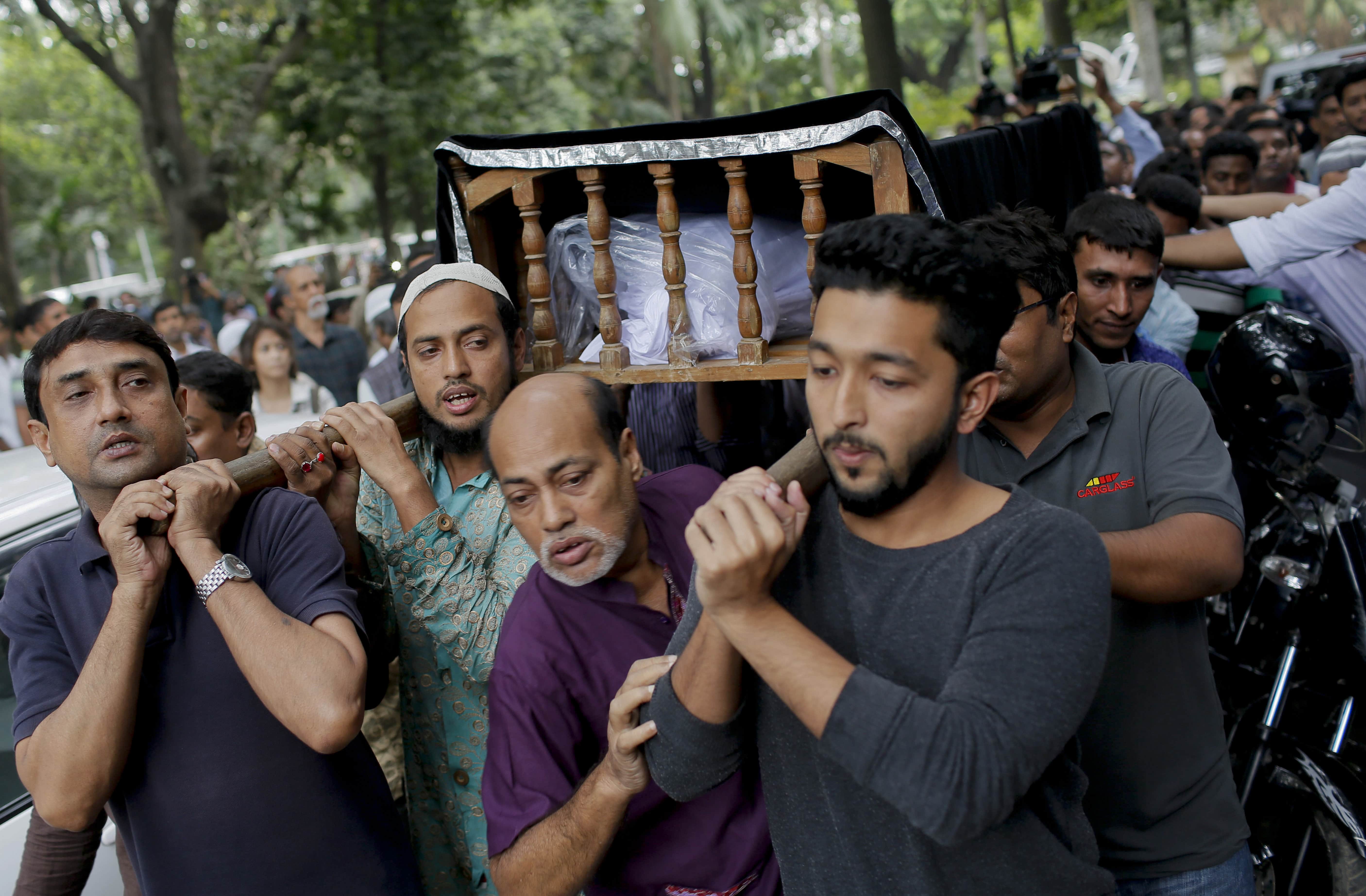 Pallbearers carry the body of Faisal Arefin Deepan, a publisher of secular books, during his funeral in Dhaka, Bangladesh, 1 November 2015. Deepan was hacked to death and three other people wounded in attacks in Bangladesh's capital that were claimed by Muslim radicals., A.M. Ahad