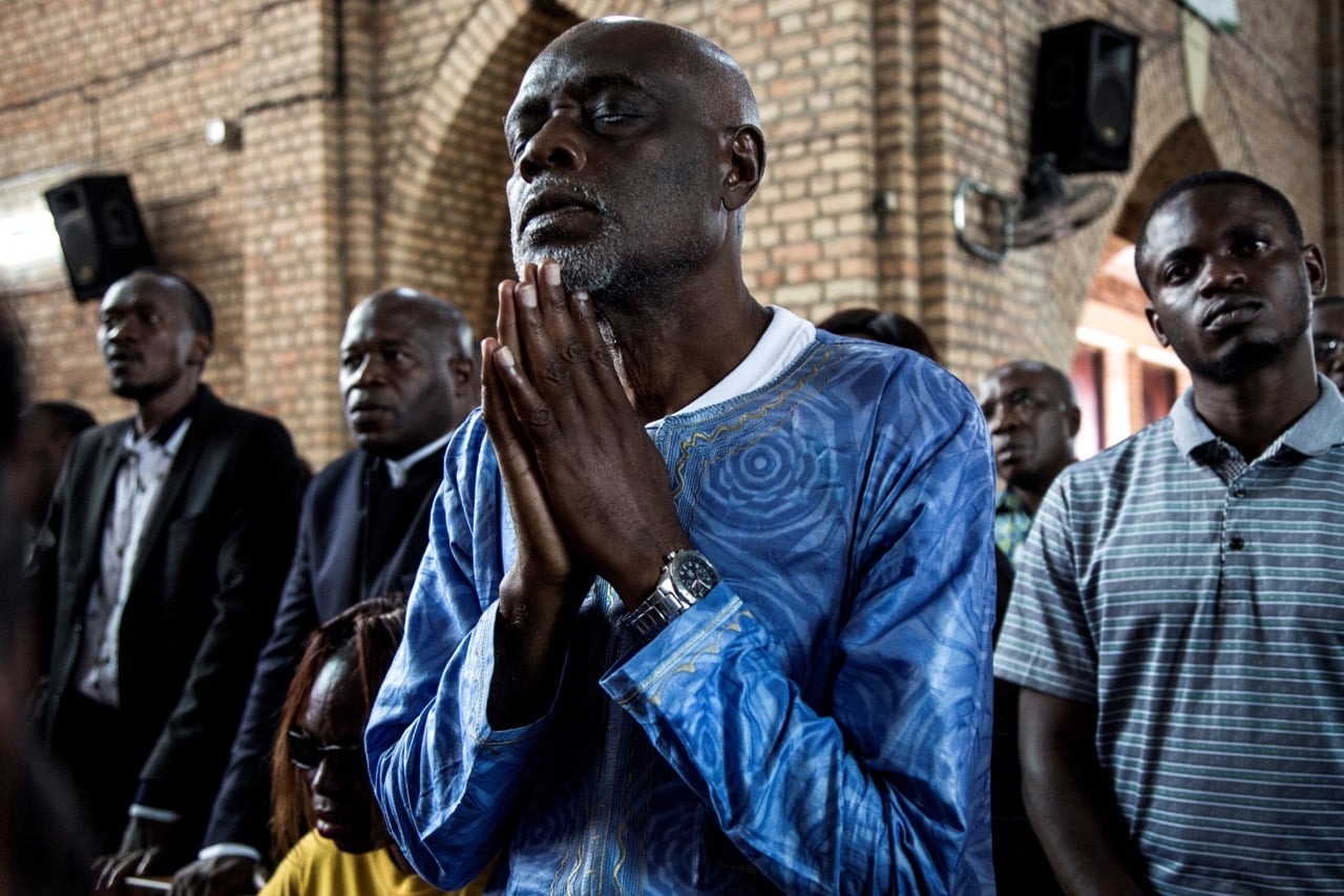 Catholic faithfuls attend a mass celebrating the Day of The Martyrs of Independence and to commemorate the people who died during the 31 December protests, on 4 January 2018 in Kinshasa, JOHN WESSELS/AFP/Getty Images