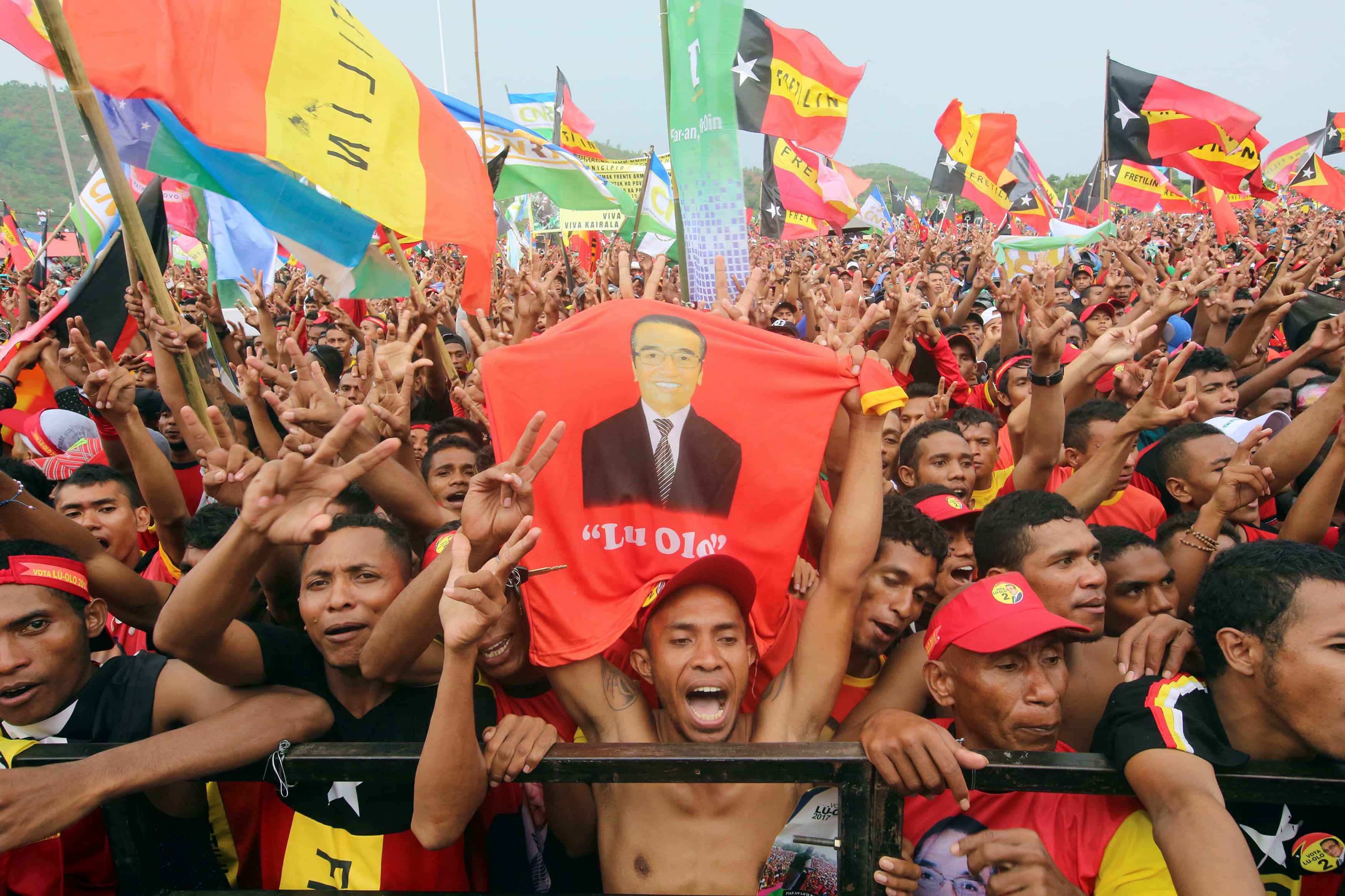 Supporters of presidential candidate Francisco Guterres of the Revolutionary Front for an Independent East Timor (FRETILIN) party cheer at a campaign rally, in Tasi Tolu, Dili, East Timor, 17 March 2017, REUTERS/Lirio da Fonseca