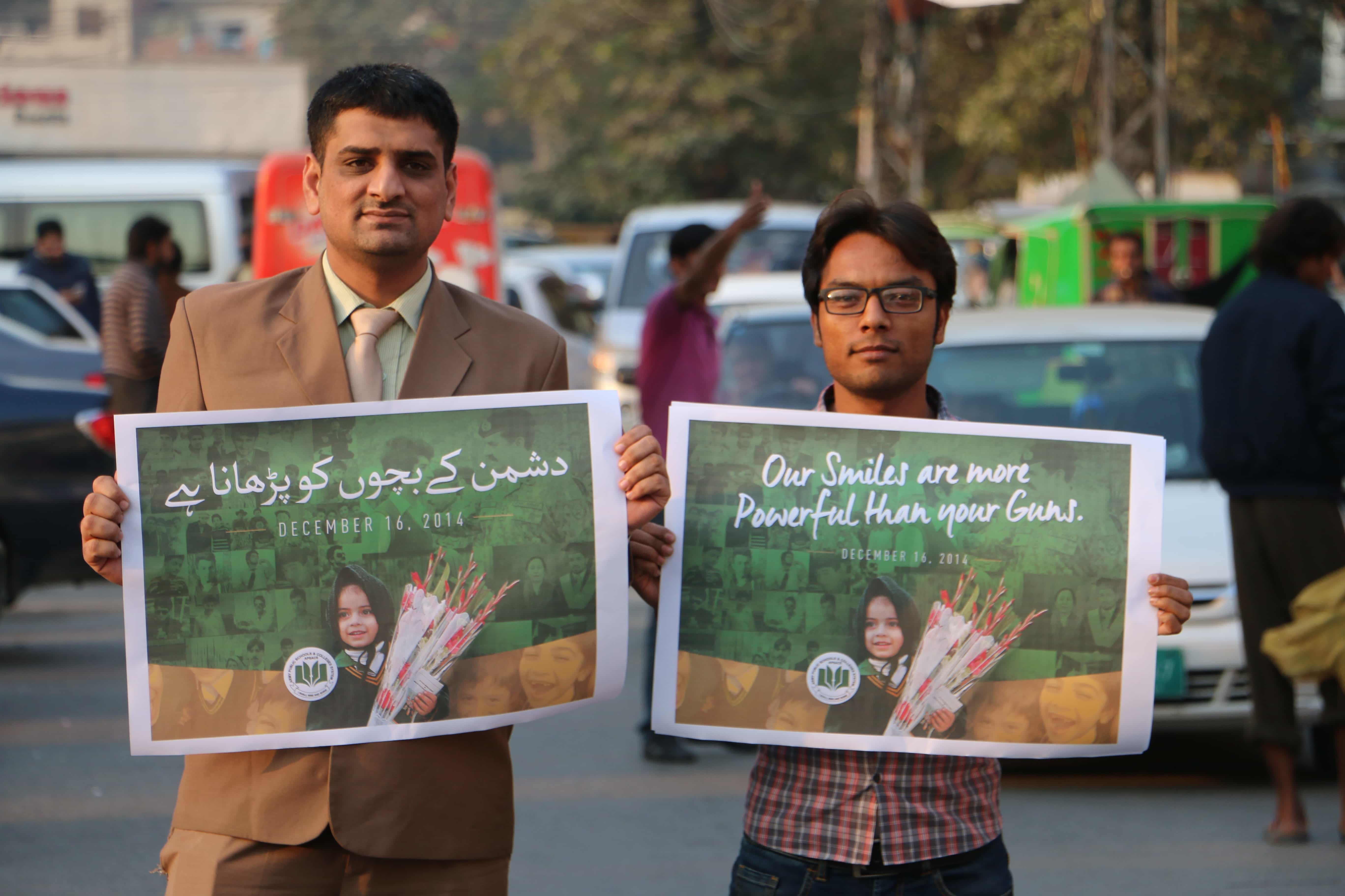 Education and peace activists hold signs on the streets of Peshawar, Pakistan, 24 February 2017, pxhere