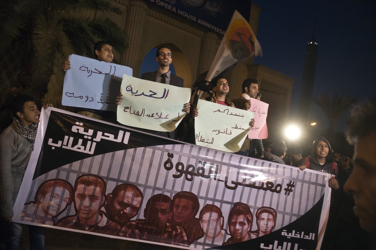 Members of the April 6 youth movement during a demonstration demanding the release of fellow activists, in Cairo, Egypt, 23 December 2013, KHALED DESOUKI/AFP/Getty Images