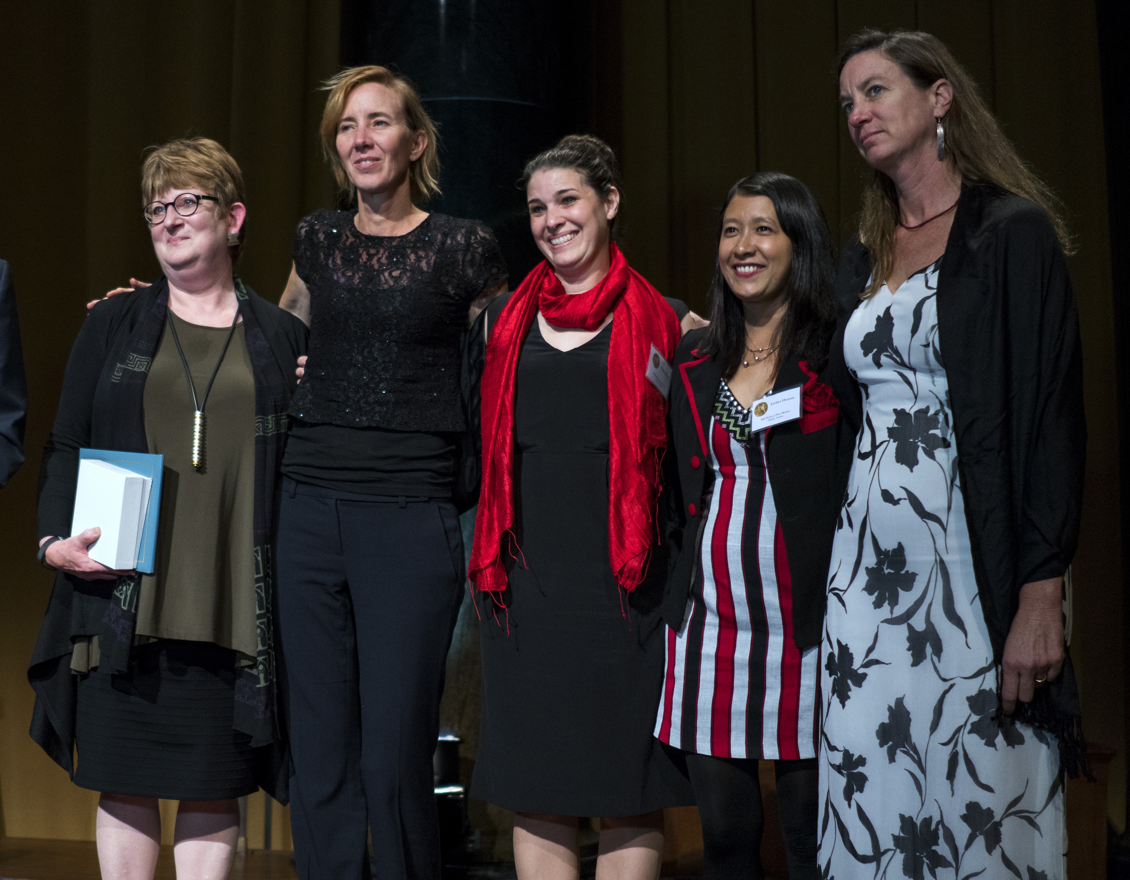 Esther Htusan and her Associated Press colleagues are recognized for the Pulitzer Prize for Public Service on 13 October 2016, AP Photo/Craig Ruttle