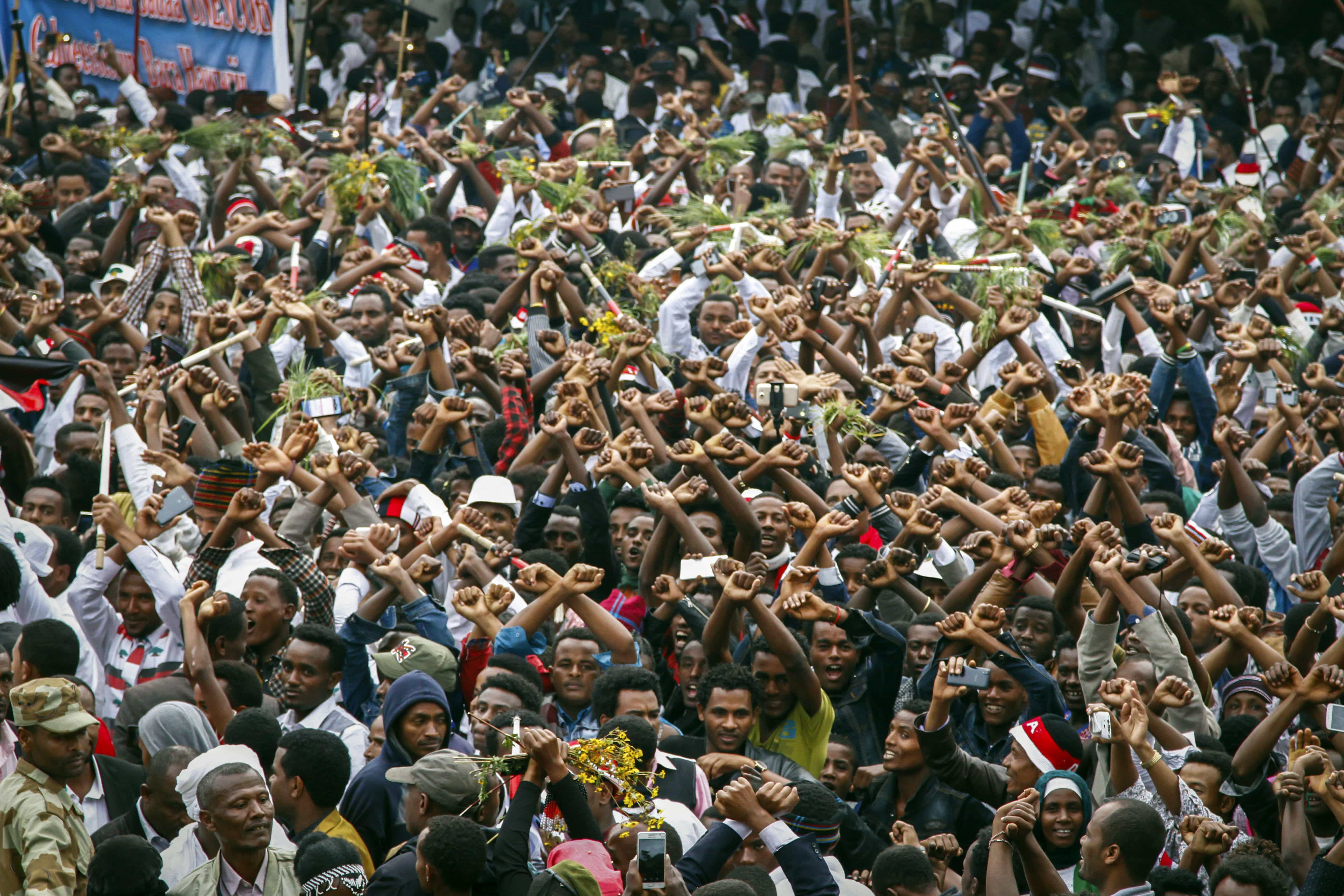 Ethiopians chant slogans against the government during a march in Bishoftu, Ethiopia, 2 October 2016., AP Photo