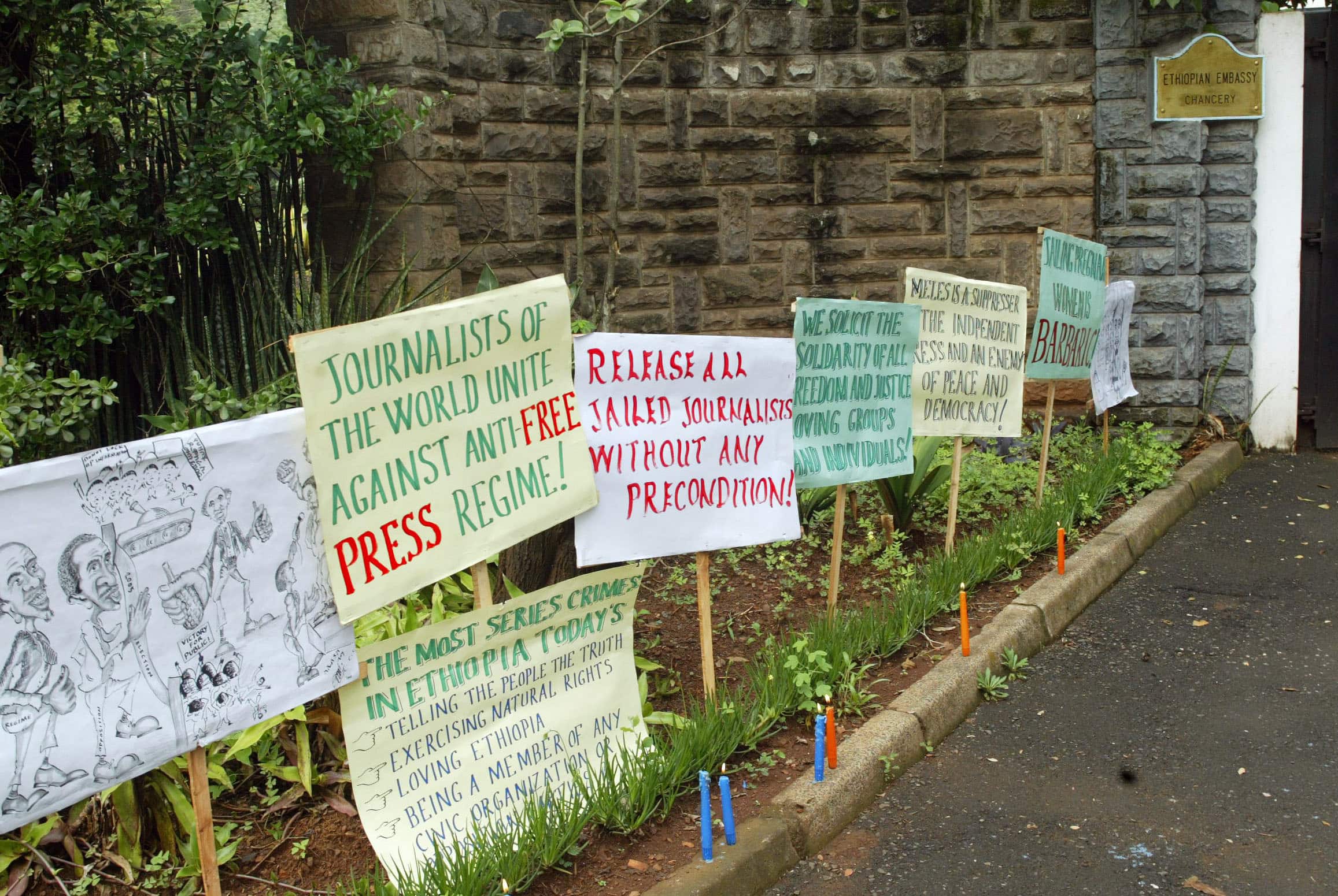 Placards are left outside the Ethiopian Embassy in Nairobi after a demonstration by Ethiopian refugee journalists in Nairobi, 2 May 2006., AP Photo/Sayyid Azim