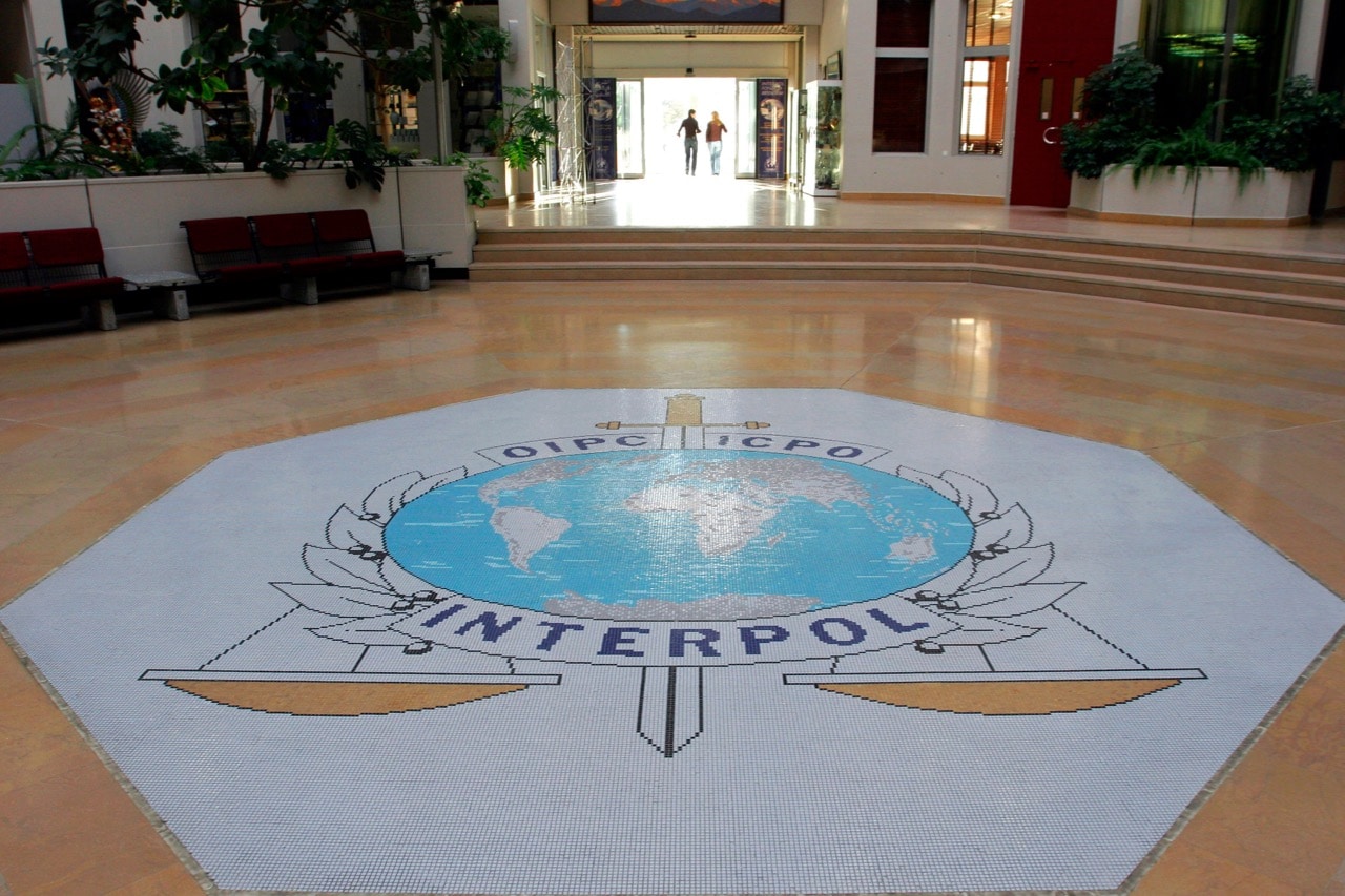 This 16 October 2007 file photo shows the entrance hall of Interpol's headquarters in Lyon, central France, AP Photo/Laurent Cipriani, File