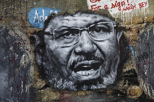 Wall art in France depicting President Mohamed Morsi , Abode of Chaos/flickr